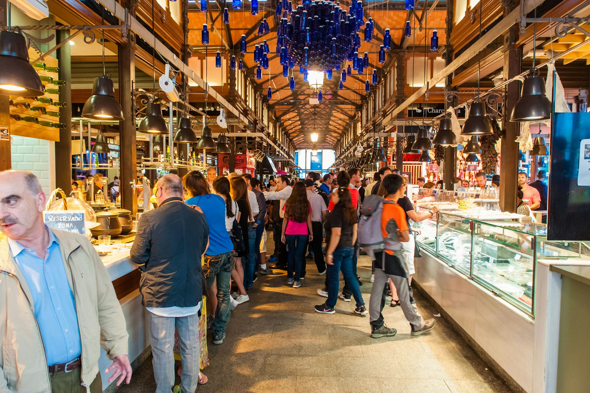 Crowds and stalls in Madrid's Mercado San Miguel