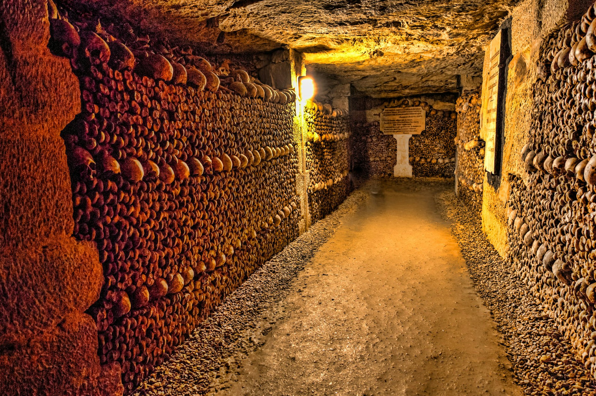 Tunnel lined with skulls and bones at Les Catacombes, Paris