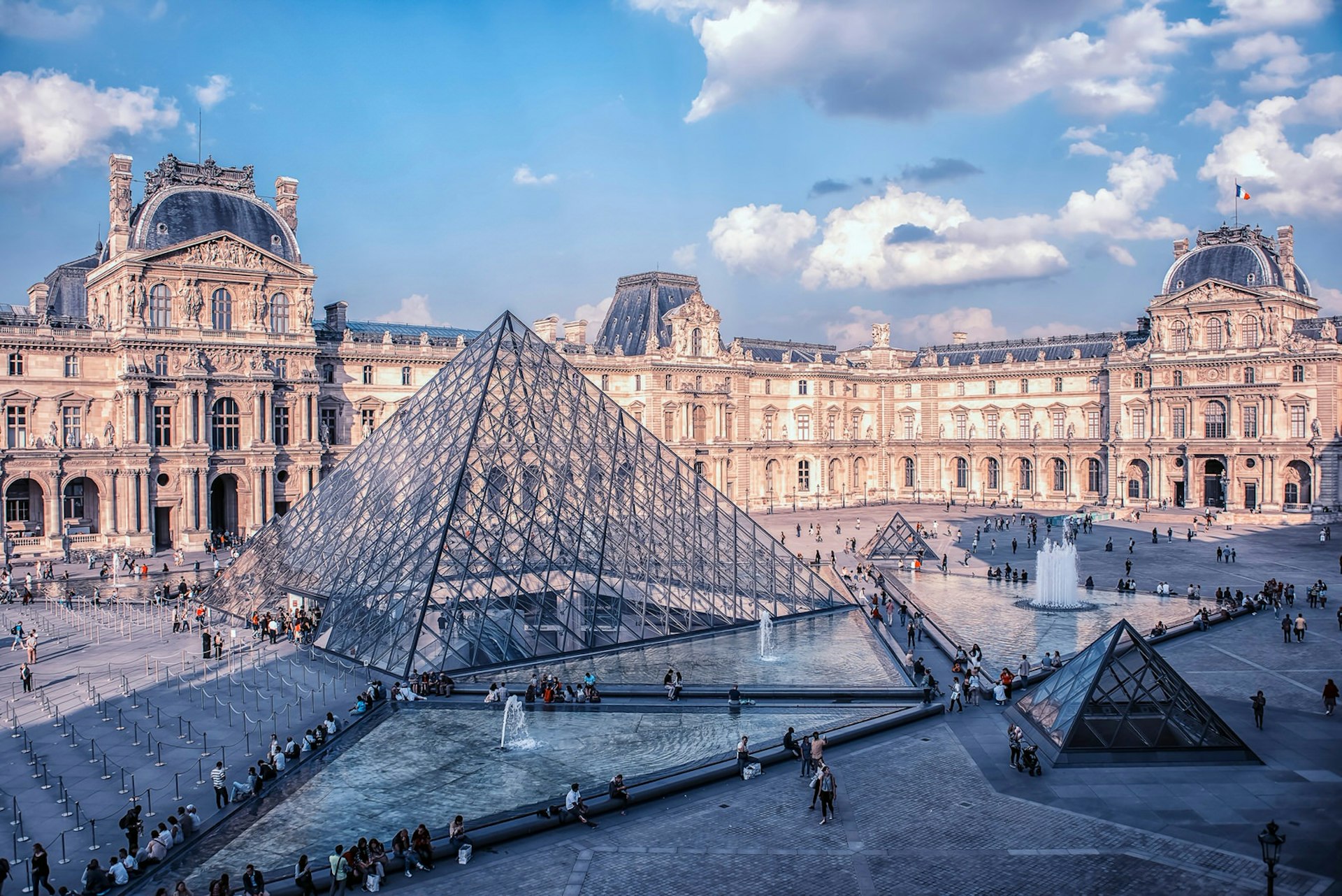 Large glass pyramid that serves as the entrance to the Louvre in Paris, France