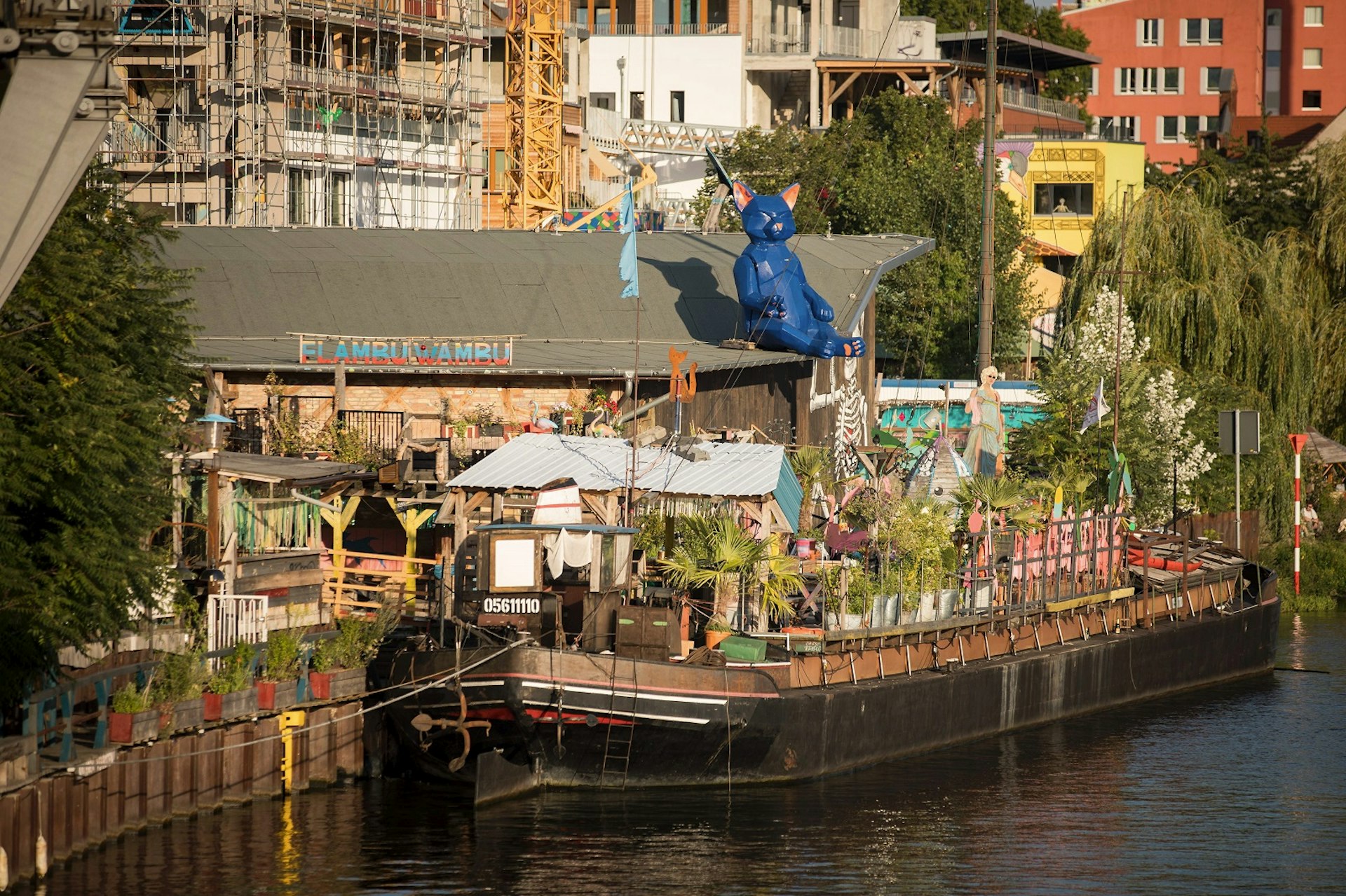 Berlin clubs - picture shows the club Kater Blau which is part of the urban cooperative project Holzmarkt 25 on the banks of the river Spree in Berlin. The project includes among others housing, cafes and restaurants, shops, a kindergarten and an event venue for up to 650 people