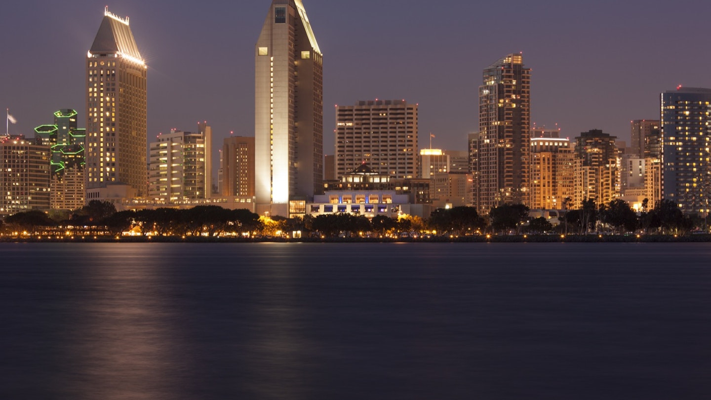 The San Diego skyline seen at night from across the bay a great city for a perfect weekend