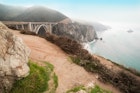 The Bixby Bridge with some fog and the ocean is a filming location in Big Little Lies