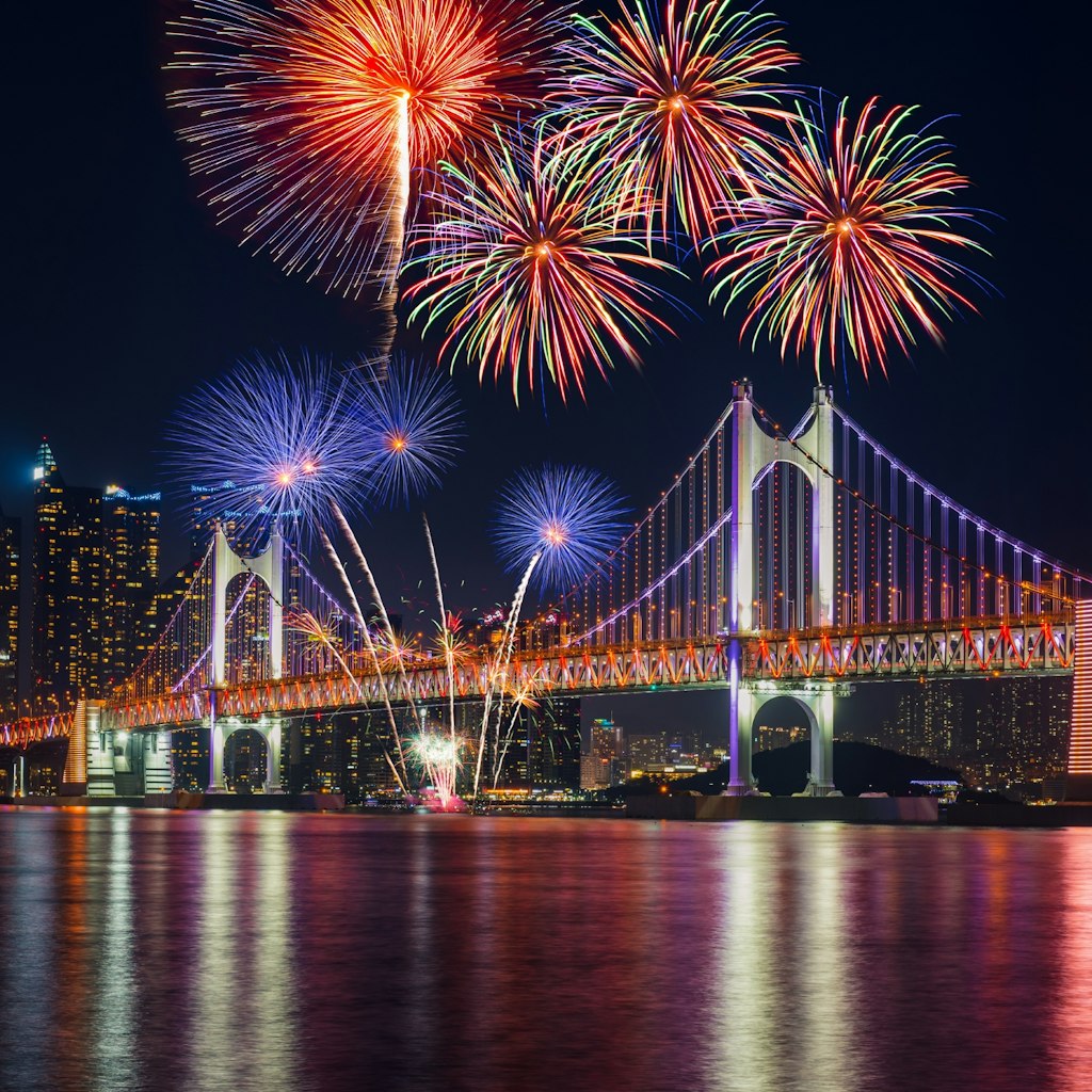 Features - Firework Display Over River At Night