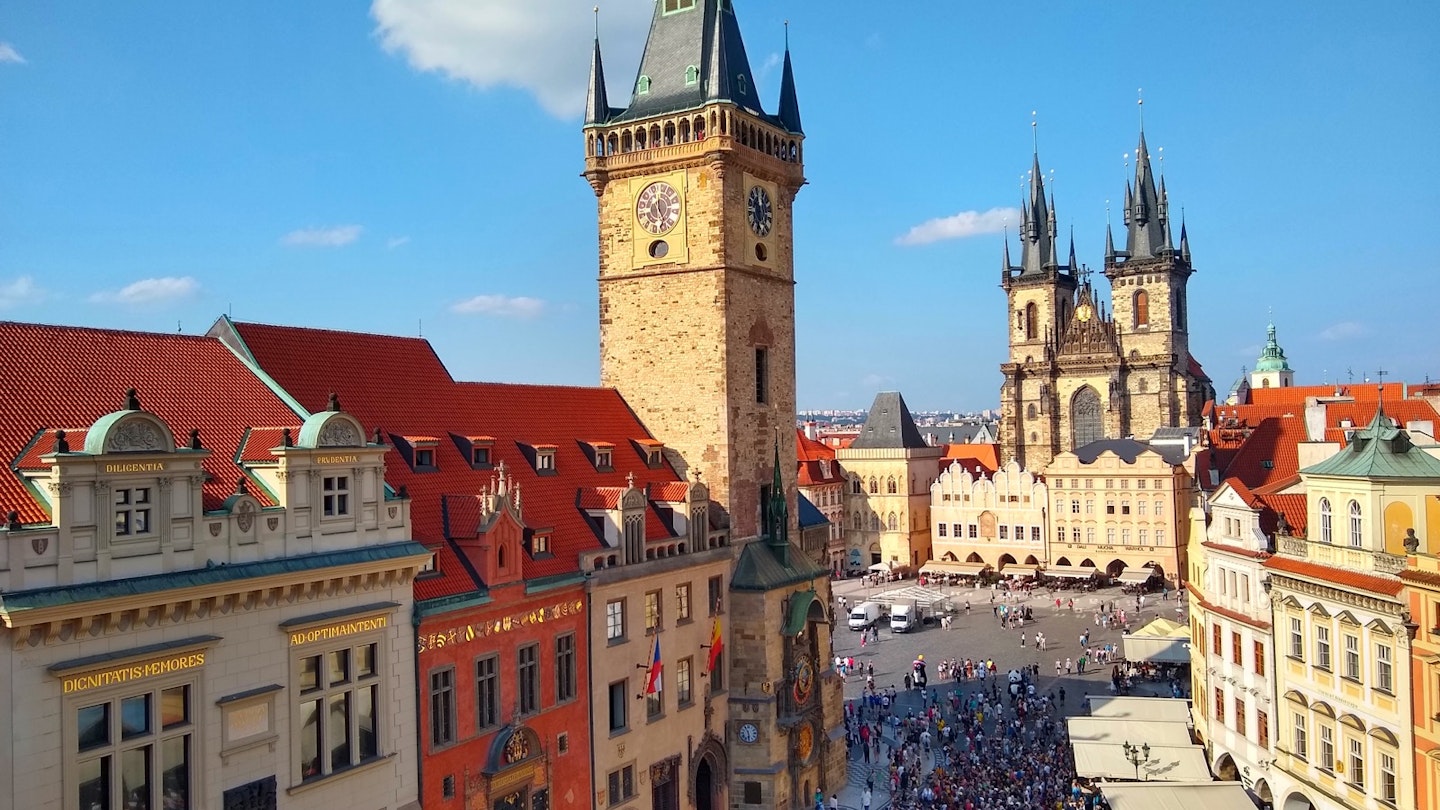 The black spires on several churches and clock towers mark the square in the Old Town neighborhood of Prague