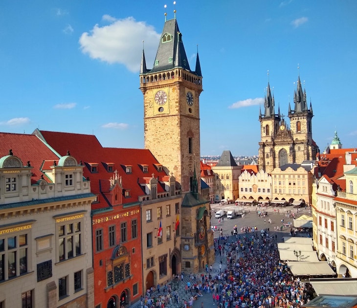 The black spires on several churches and clock towers mark the square in the Old Town neighborhood of Prague