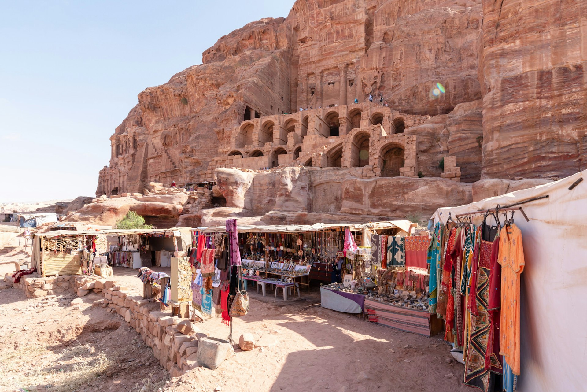 Local Bedouin operate shops in front of the Royal Tombs, Petra, Jordan
