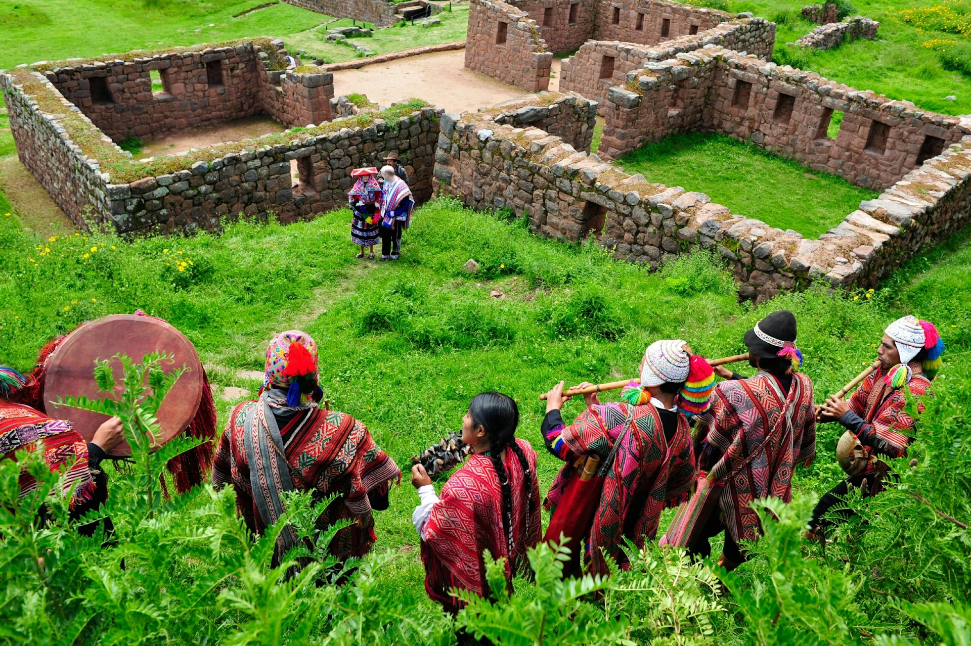 Traditional peruvian wedding ceremony at the Temple of Water ruins in Sacred Valley near Cuzco