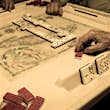 Four old cuban exiles playing domino in calle ocho; free things Miami