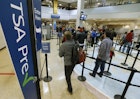 Passengers enter the TSA pre boarding line and make their way through a TSA security check point at the Salt Lake City International Airport; Equifax