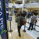 Passengers enter the TSA pre boarding line and make their way through a TSA security check point at the Salt Lake City International Airport; Equifax