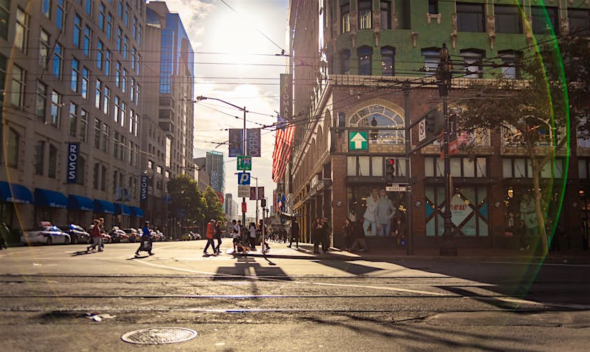 People walk down market street in San Francisco. Weekend in San Francisco 
