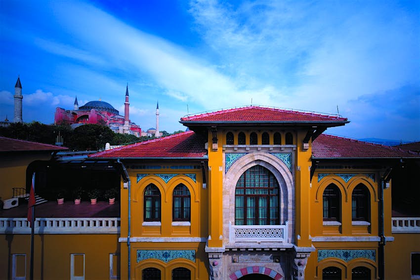 A colorful photograph of a hotel that was once a historic prison in Istanbul.