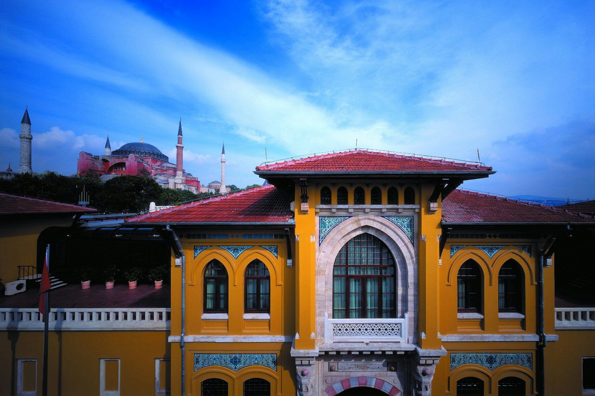 A colourful photograph of a hotel that was once a historic prison in Istanbul.