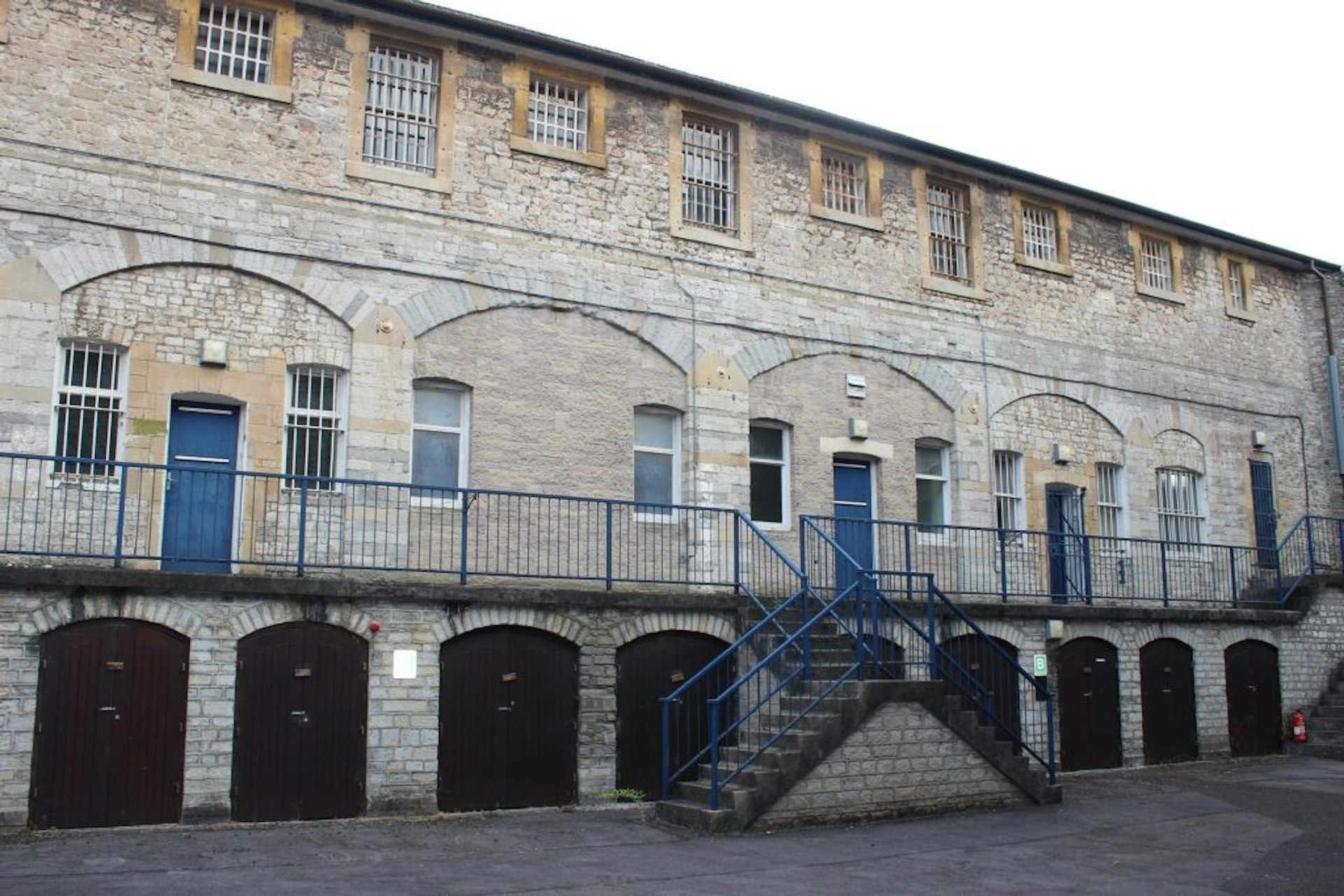The blank exterior of the hotel, which was once a prison.