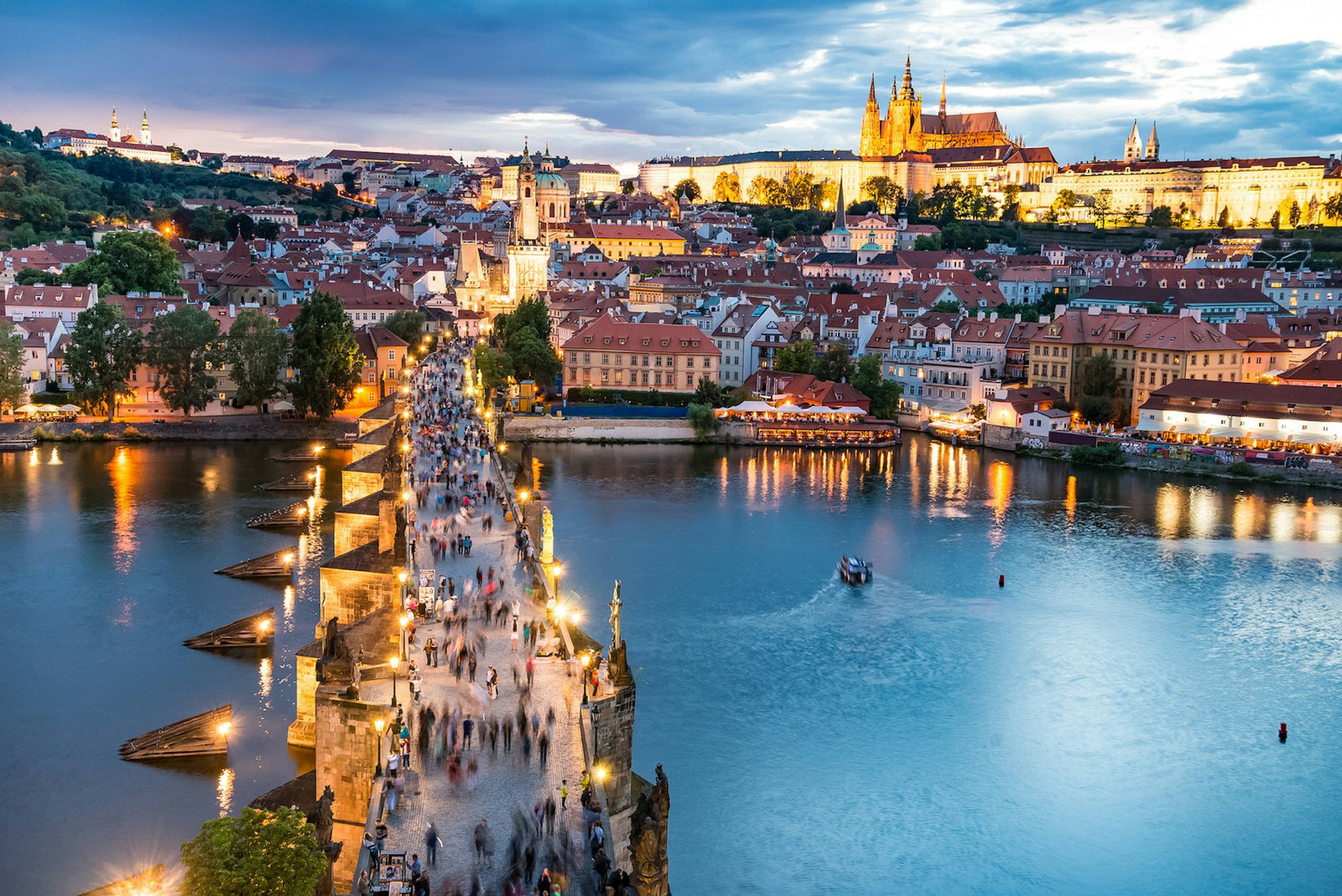 Panorama of Prague with red roofs from above on a summer day at dusk, Czech Republic