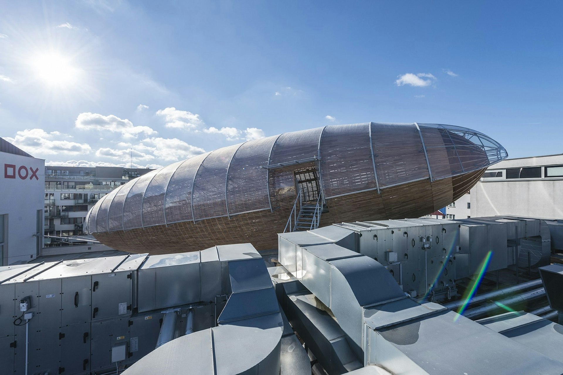 External view of DOX gallery and its striking wooden airship