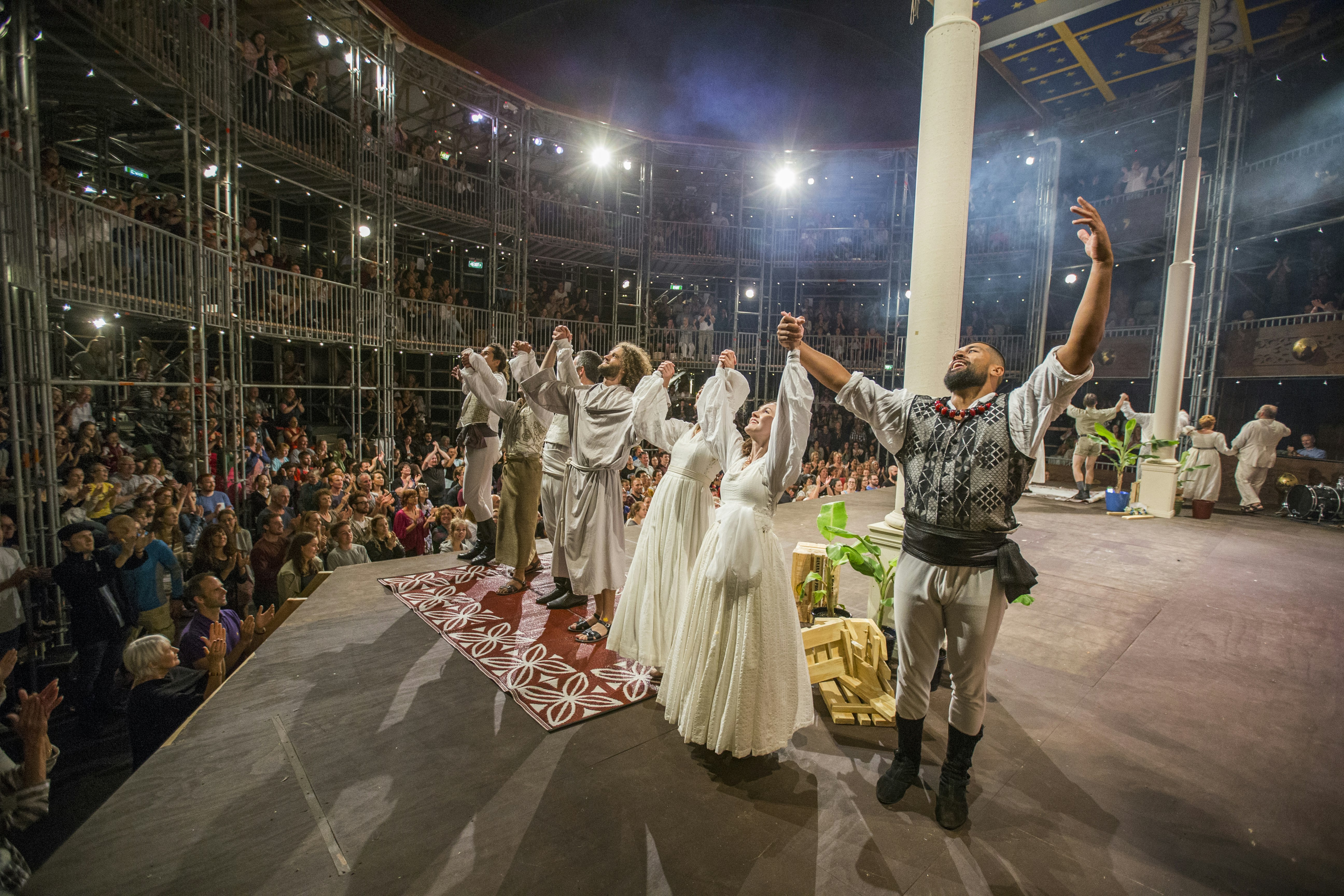 Cast on stage receiving applause.jpg