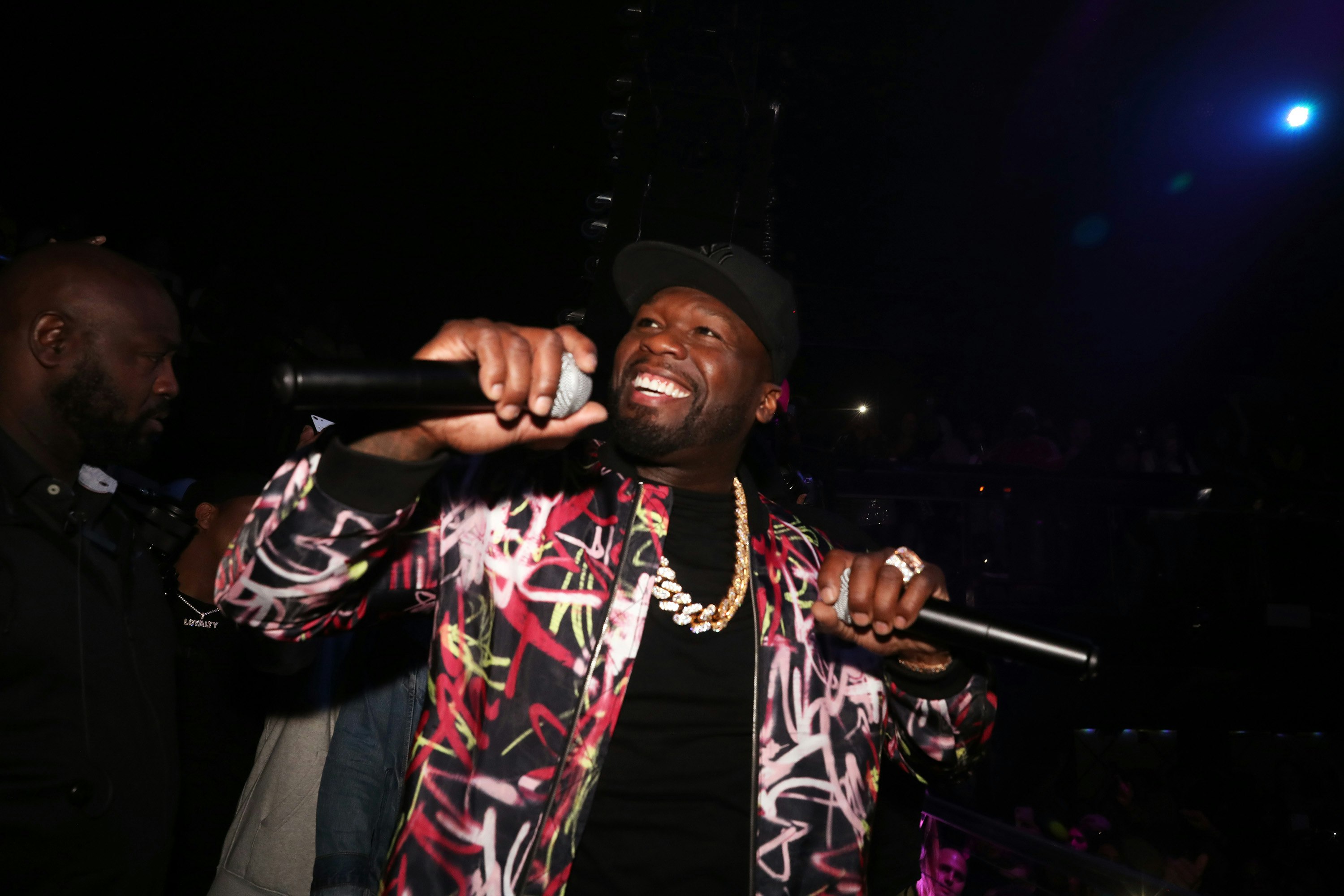 The rapper 50 Cent performs live in a club. Editorial use only