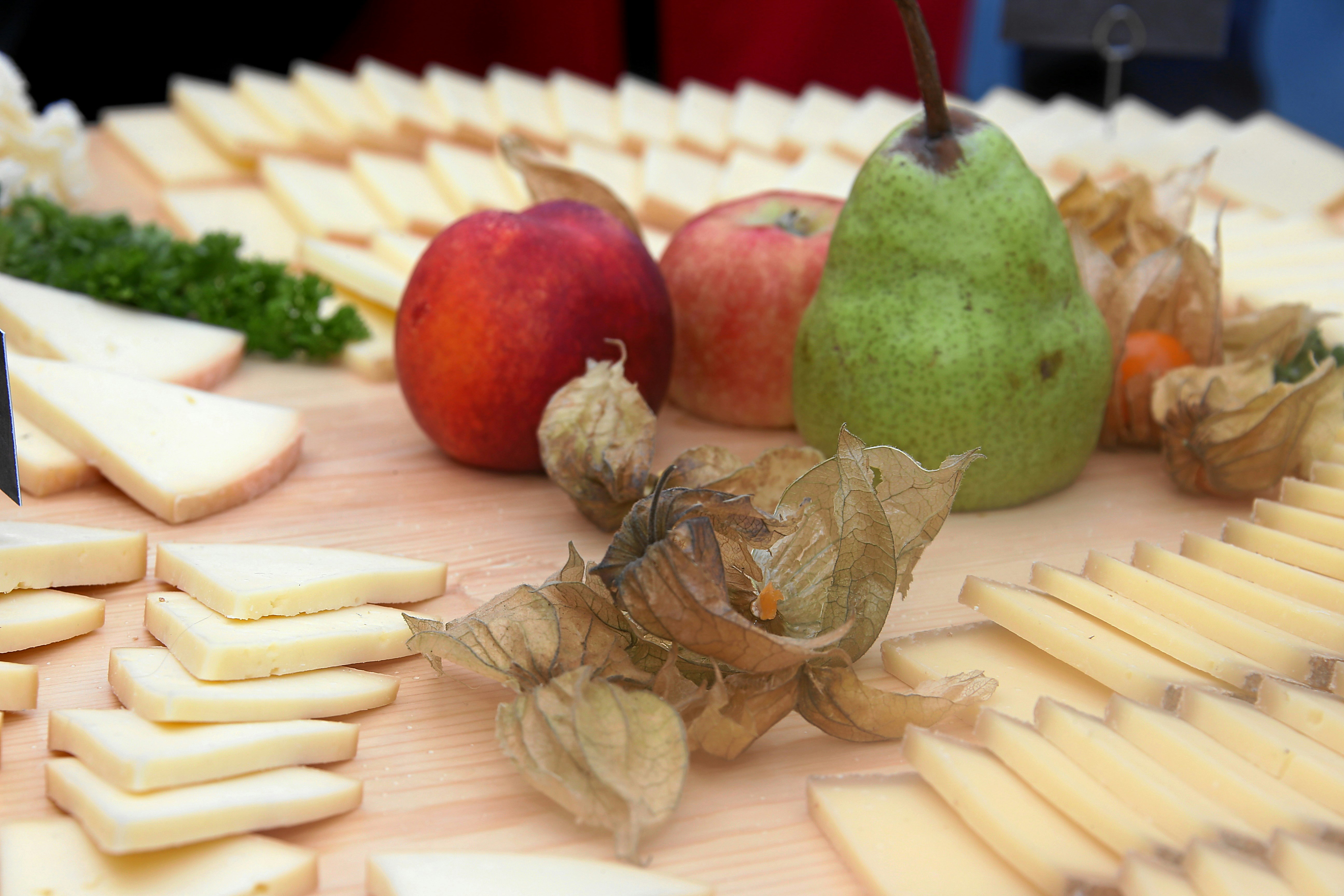 A cheese platter with several varieties of delicious Swiss cheese