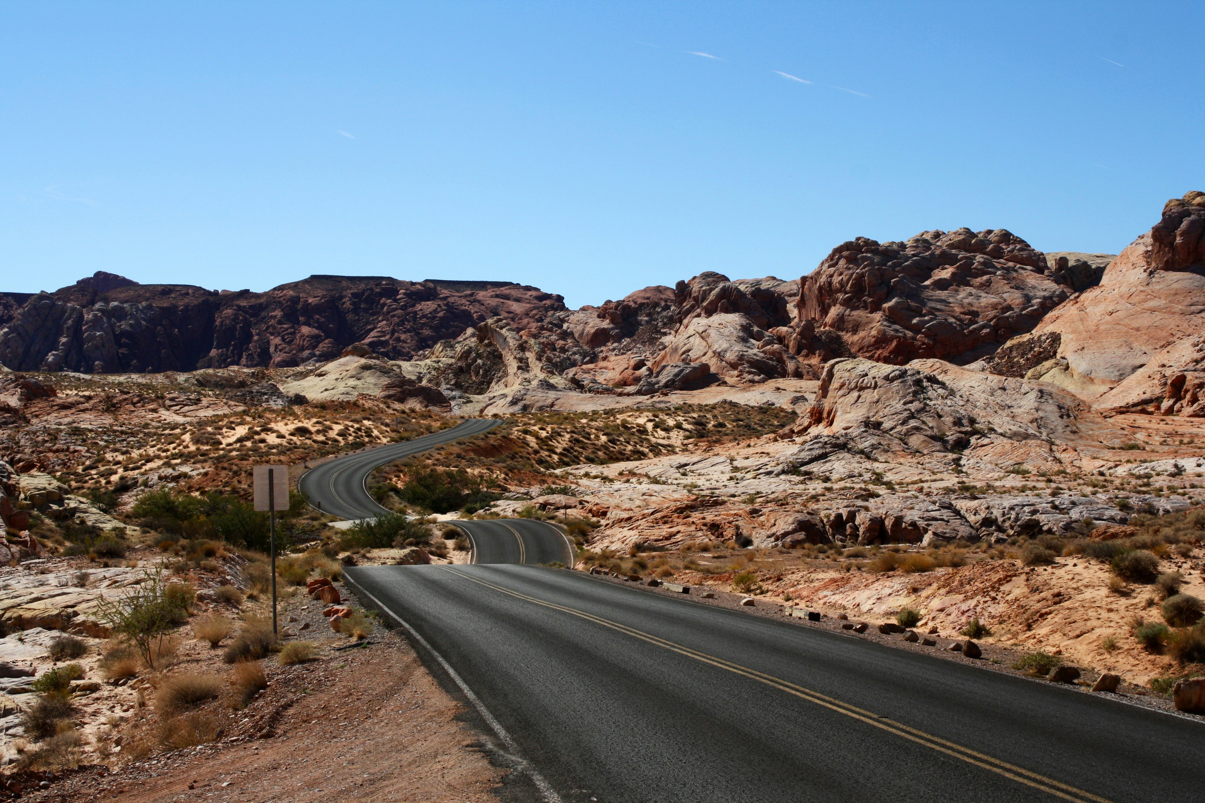 A road winds through the undulating landscape of rocky Valley of Fire State Park