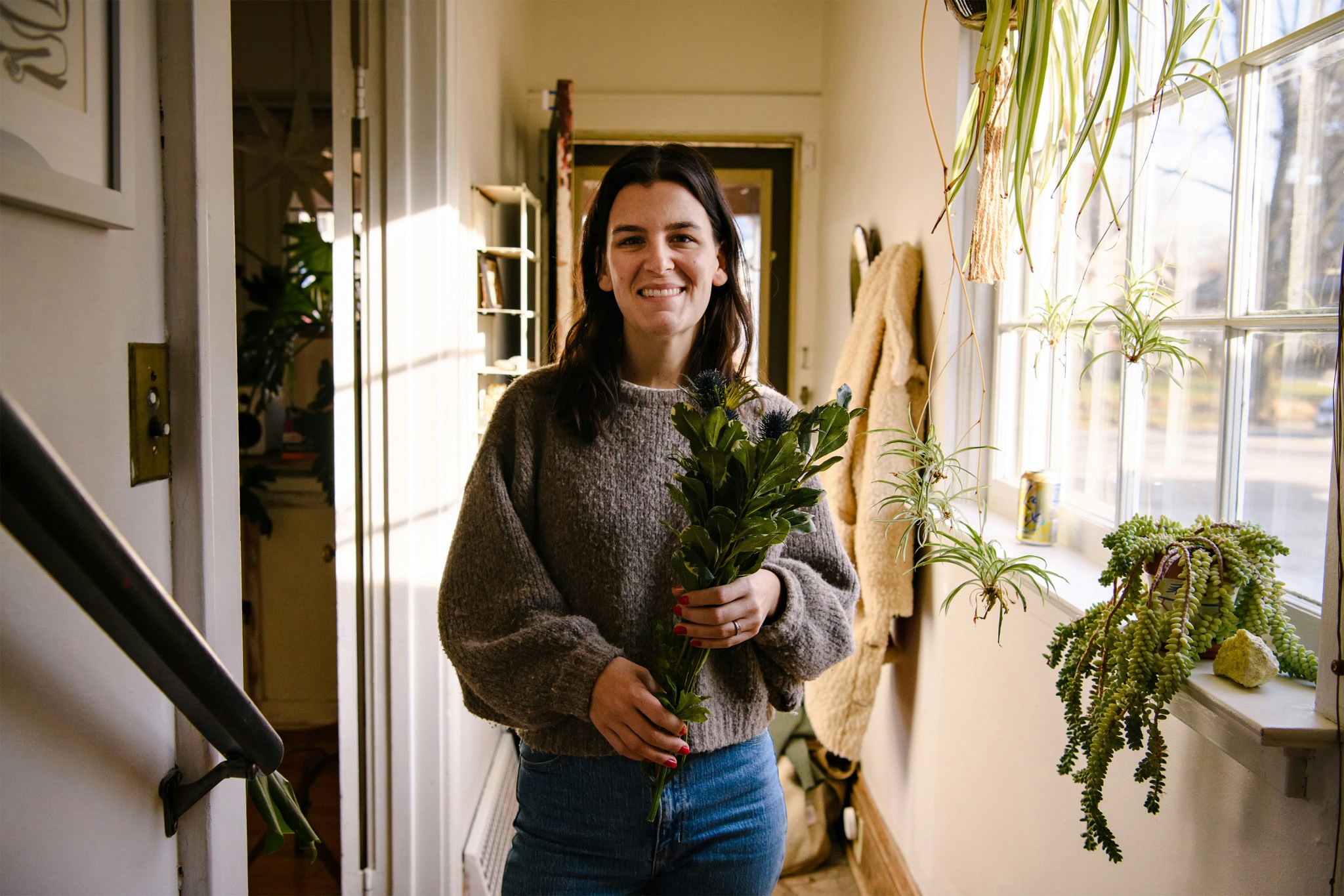 A woman with house plants