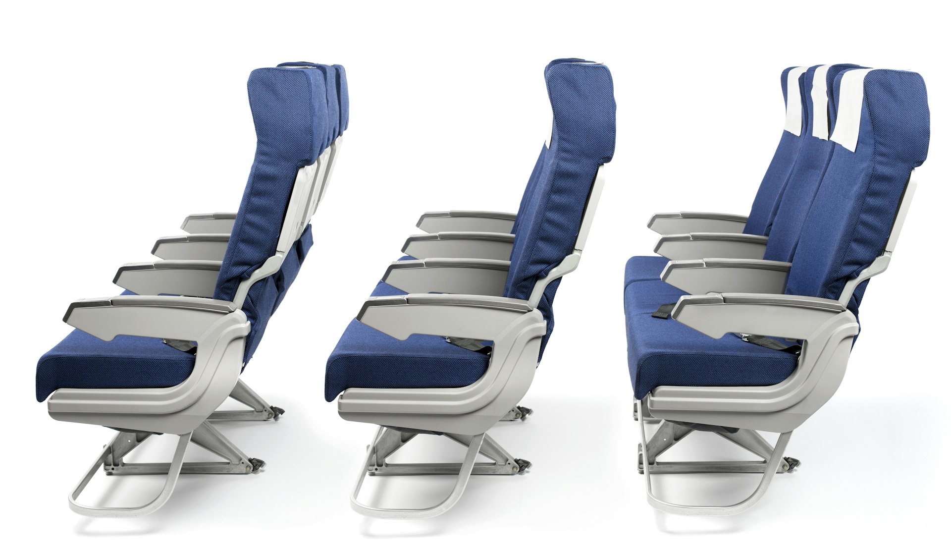 Three rows of blue airline seats over a white background. The seats have grey armrests and blue fabric elsewhere.