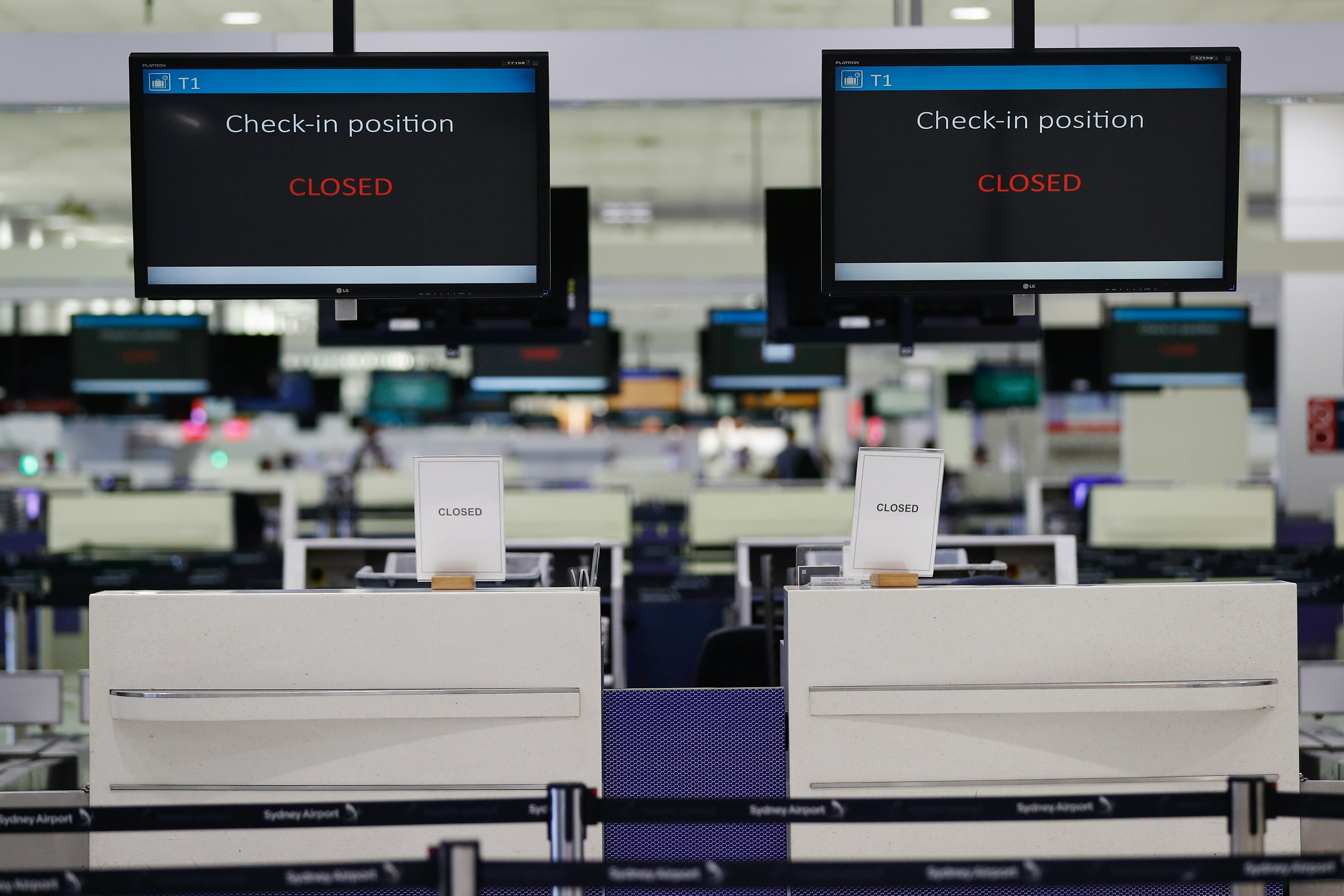 Check-in desks closed at Sydney Airport amid COVID-19 pandemic