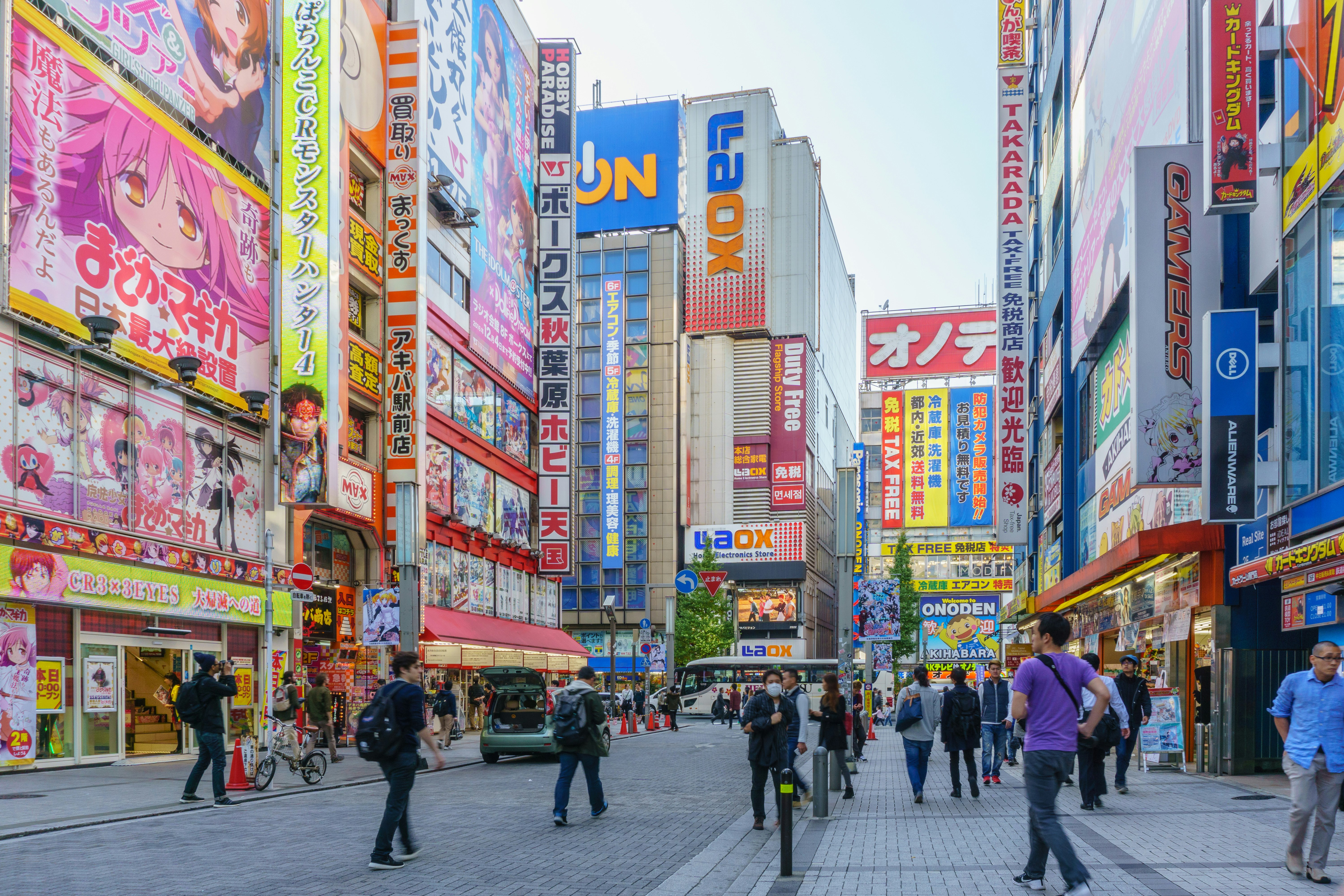 Bright neon signs and colourful billboard advertisements in Tokyo's Akihabara district