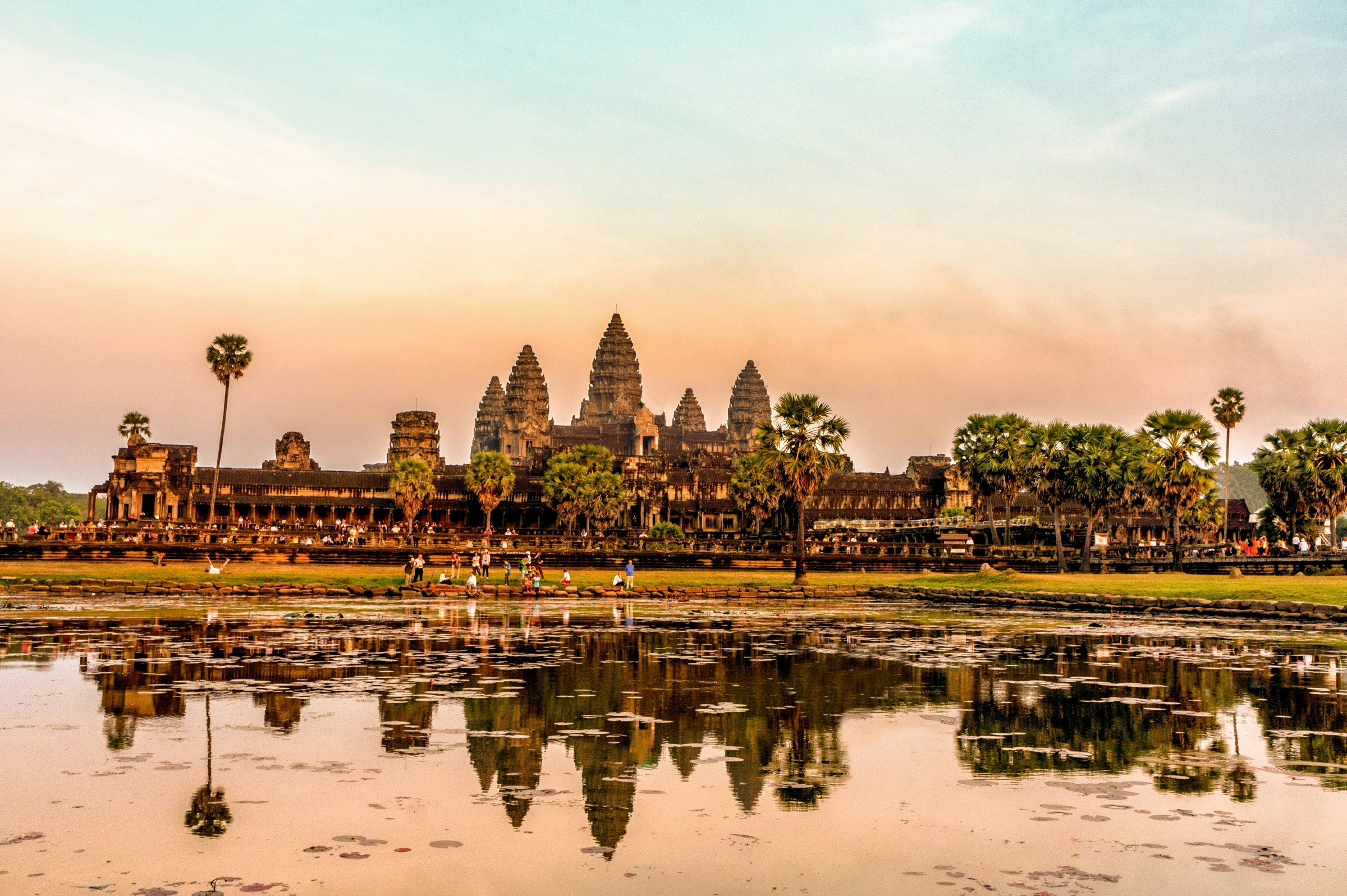 Angkor Wat reflected in water at sunset.jpg