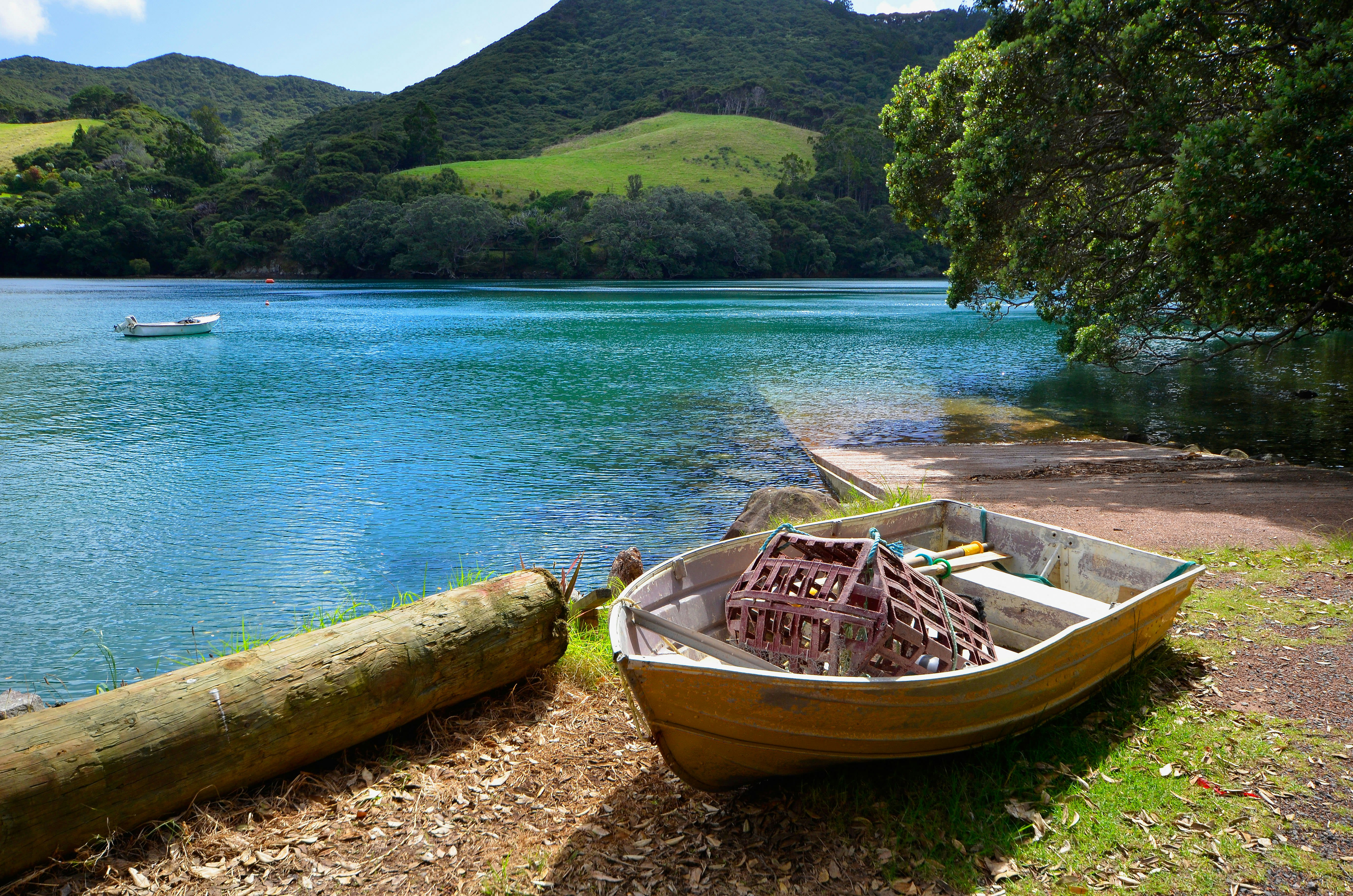 Rowing boat at the Port Fitzroy Wharf on Great Barrier Island.