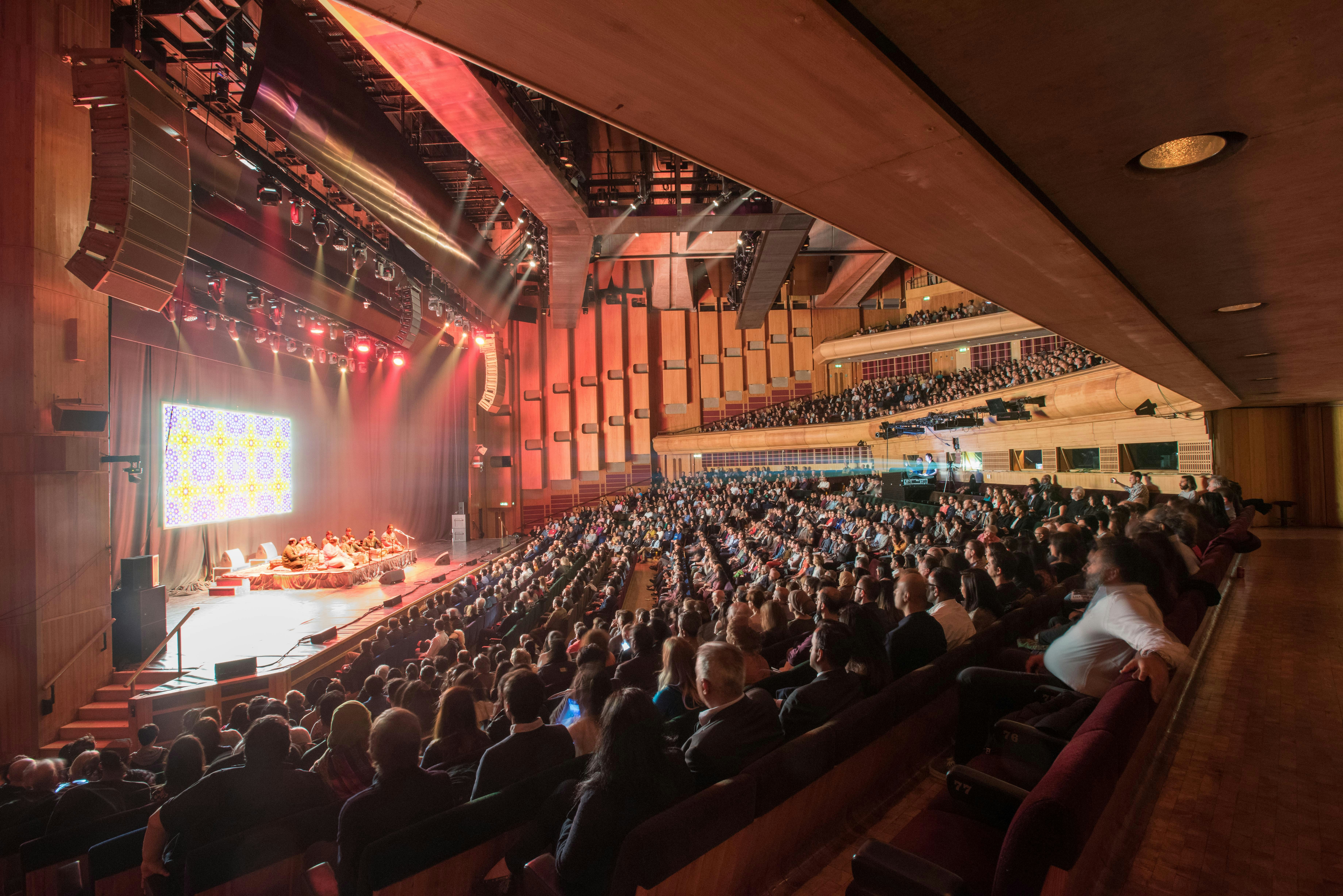 Interior of Barbican Hall in London, decked out in blond wood.