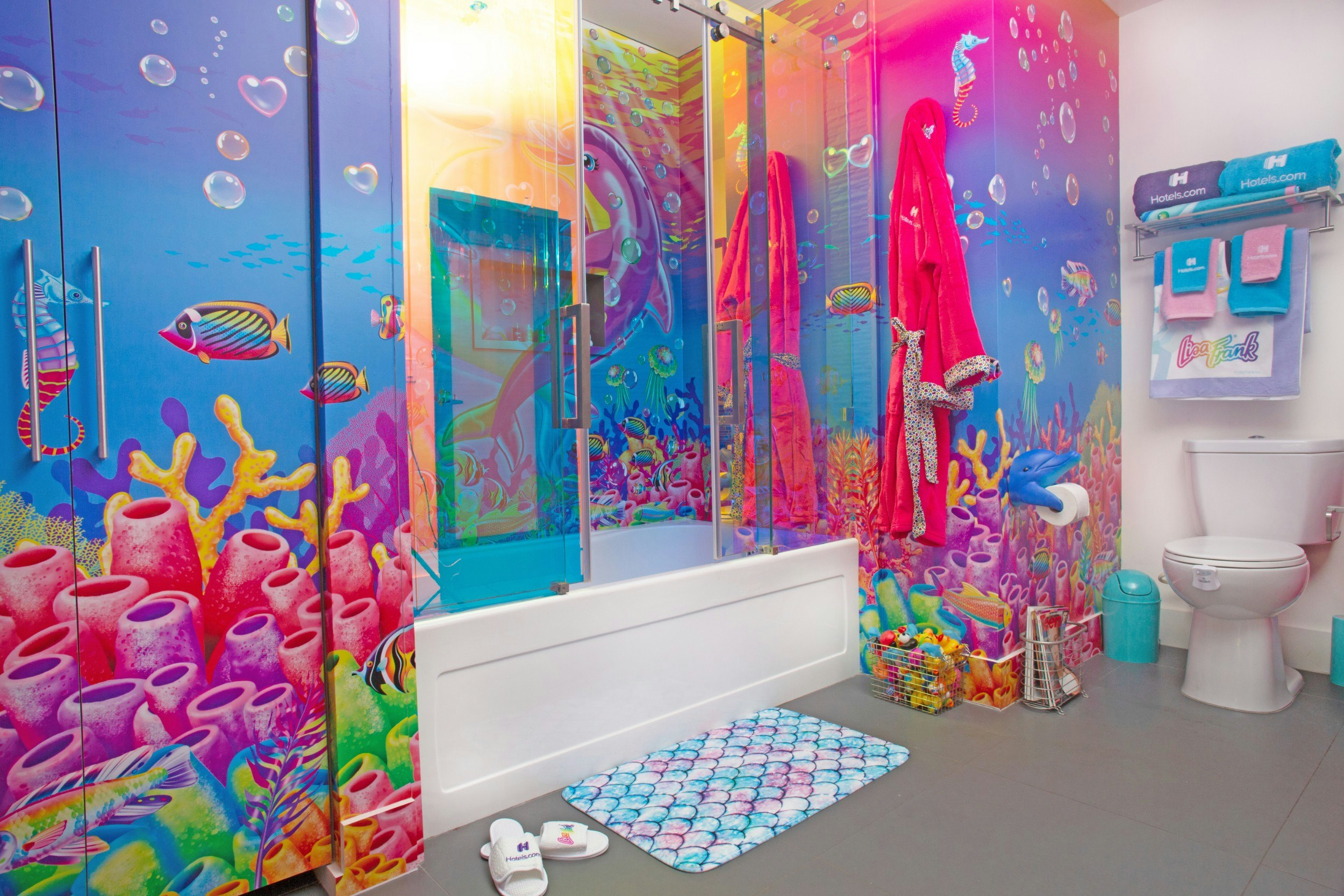 The colourful bathroom at the Lisa Frank Flat complete with pink bathrobe