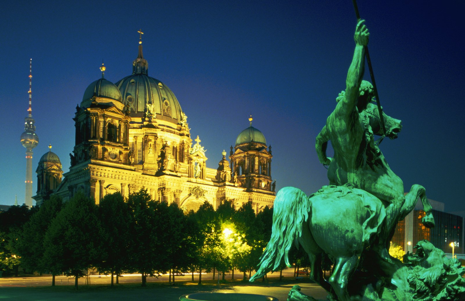 Berlin Cathedral illuminated at night, seen from the Altes Museum.