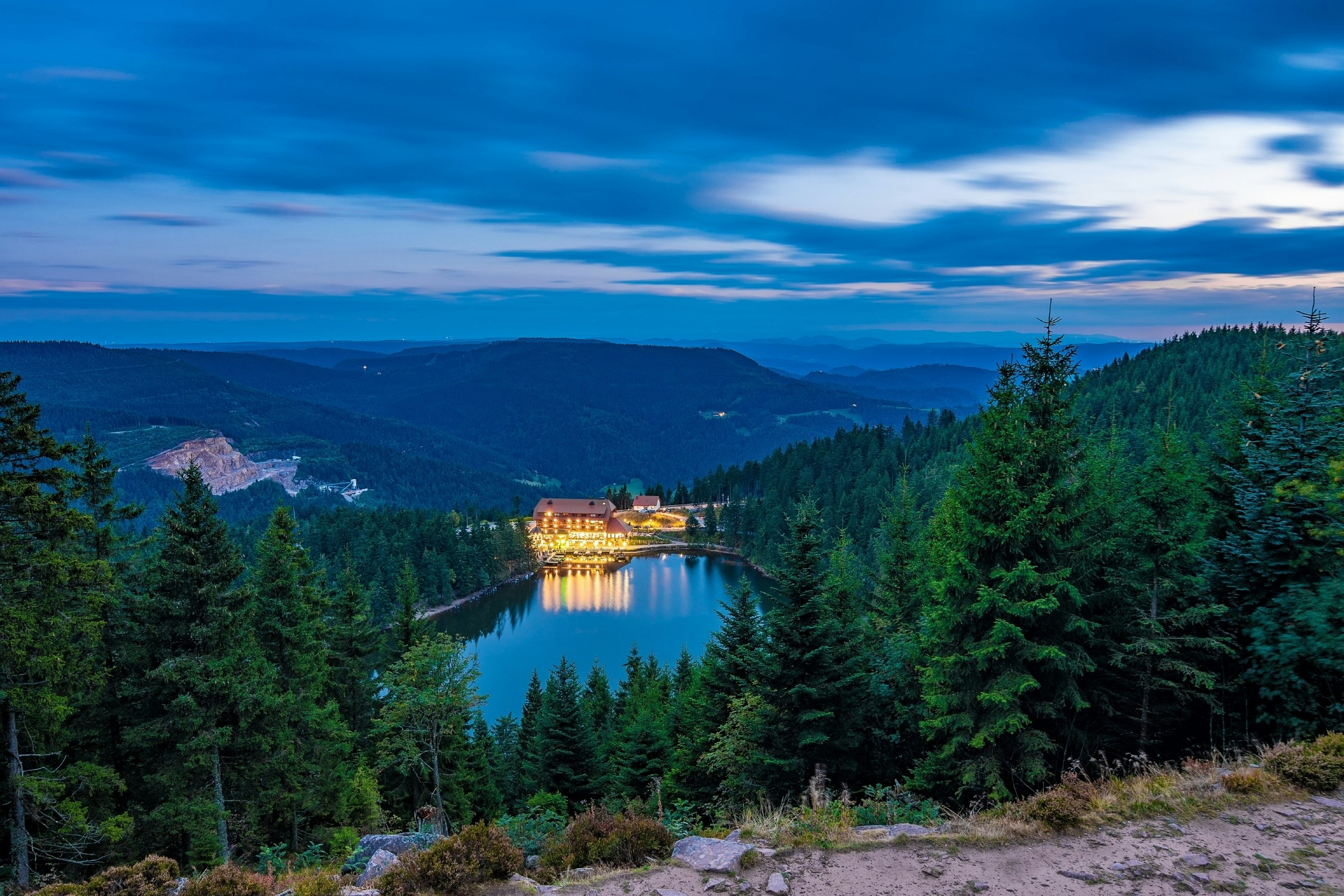 High-angle view of the Mummelsee lake in the Black Forest at night.