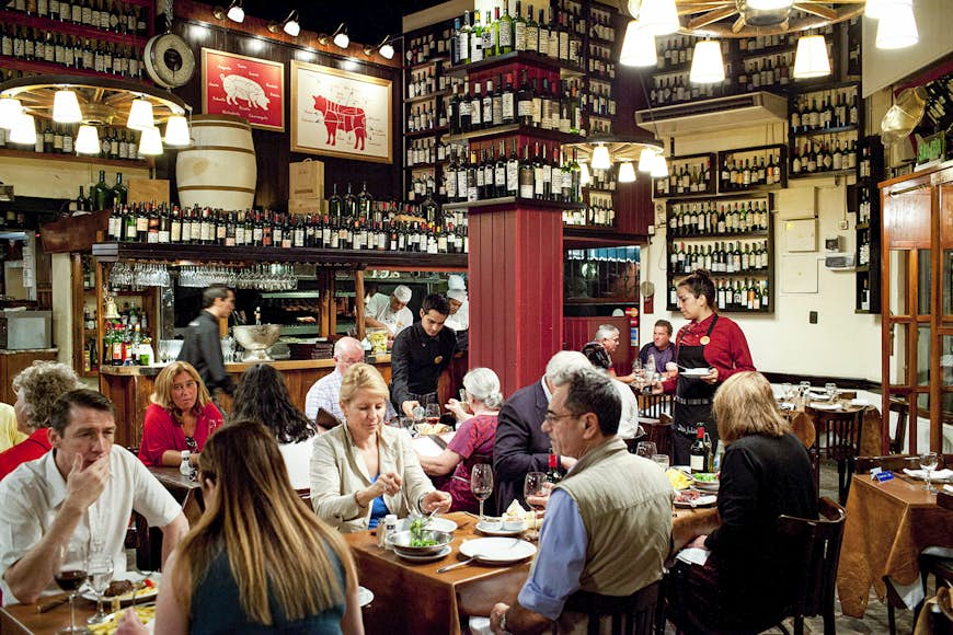 People eating at a bodega in Buenos Aires