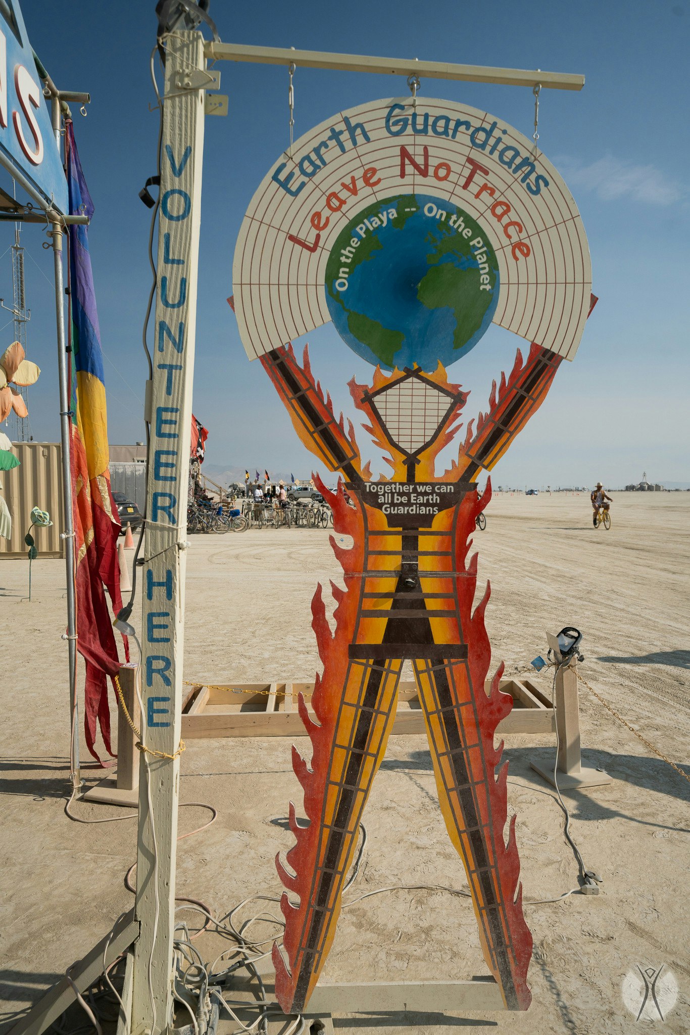 A sign for the Earth Guardians promotes sustainability at Burning Man. 