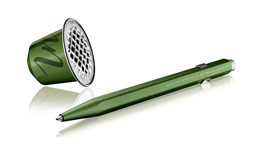 Caran d'Ache x Nespresso 849 Pen.jpg Caran d'Ache x Nespresso 849 Pen next to a green aluminum coffee pod