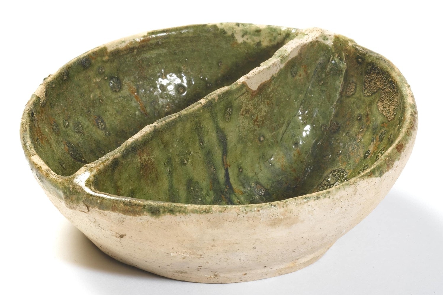 a 14th – 15th century ‘coarse border ware’ condiment dish with copper green glaze