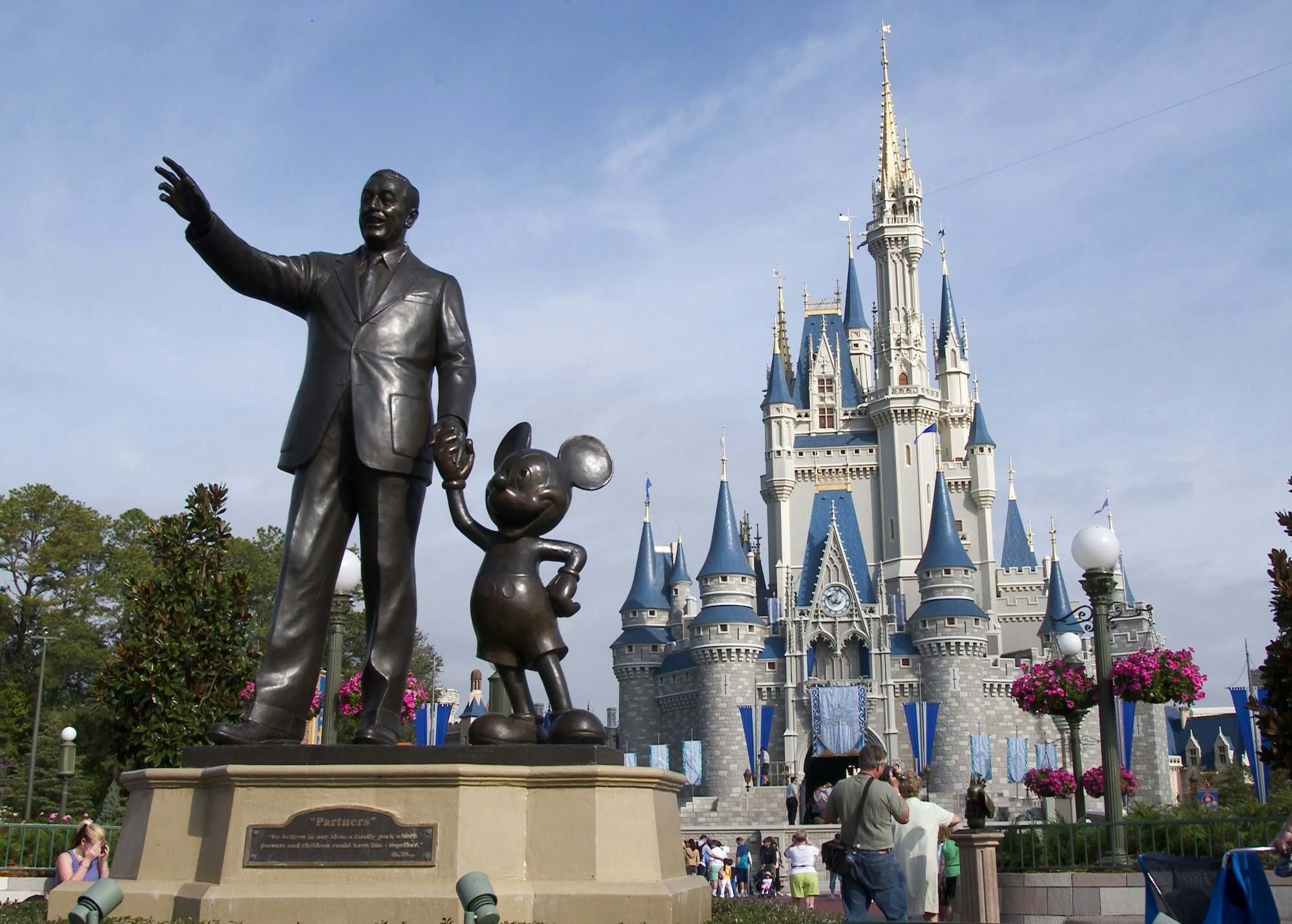 Statues of Walt Disney and Mickey Mouse in front of Cinderella Castle 2.jpg