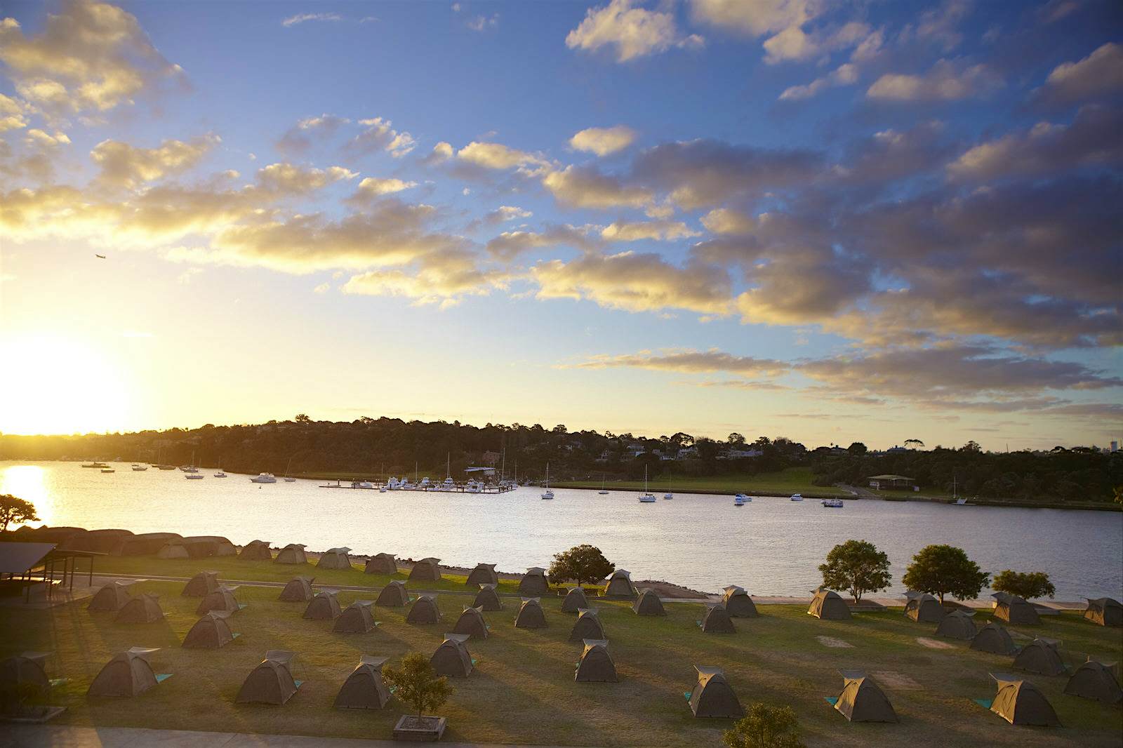 Cockatoo Island, urban adventure Campsite on Cockatoo Island overlooking harbour at sunset.