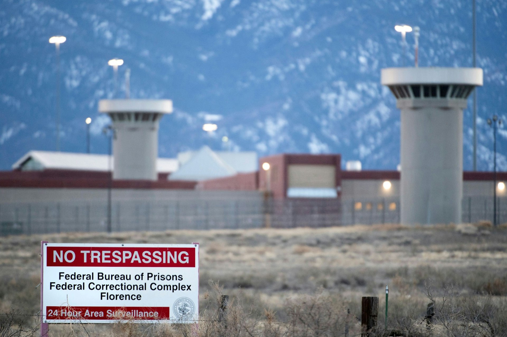 A high-security prison with the Rocky Mountains in the background