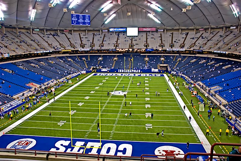 Aerial view of the inside of a sparsely populated Lucas Oil Stadium, home of the Indianapolis Colts; nfl cities travel