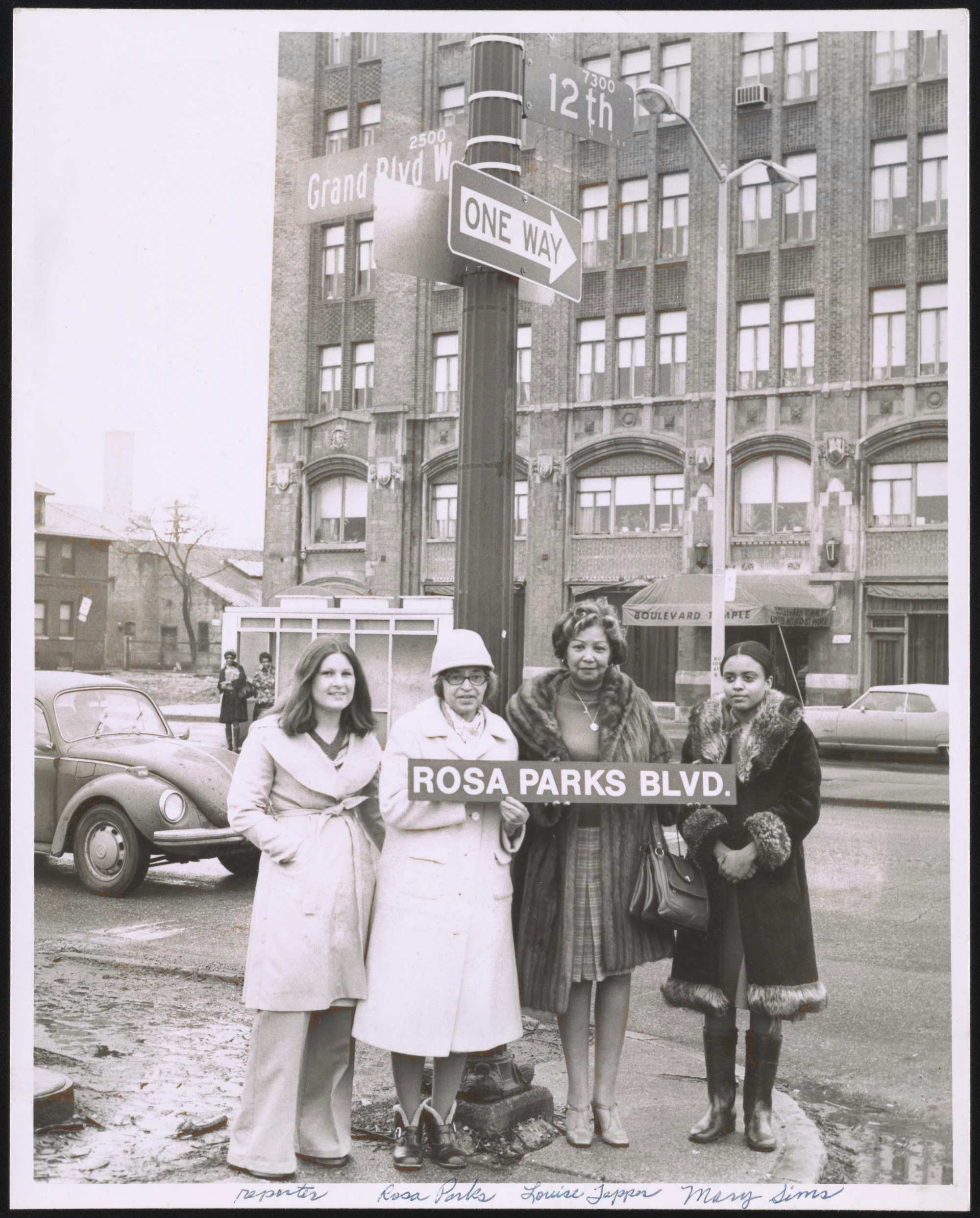 Four women in 1970s holding a sign saying "Rosa Parks Boulevard".jpg