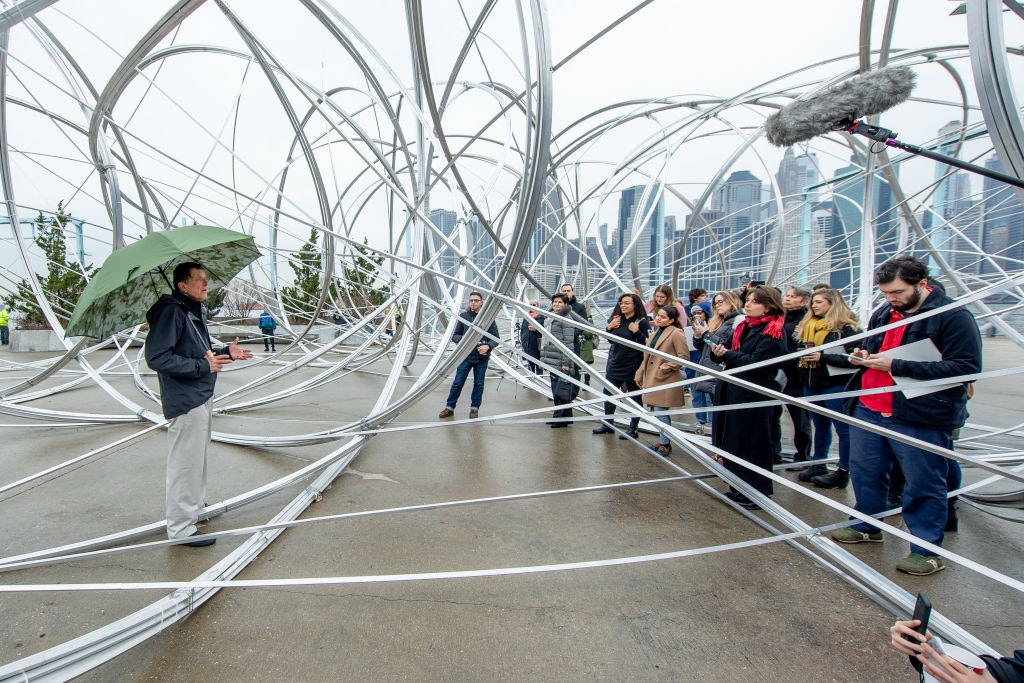 Artist Antony Gormley unveils his aluminium installation on Brooklyn Bridge