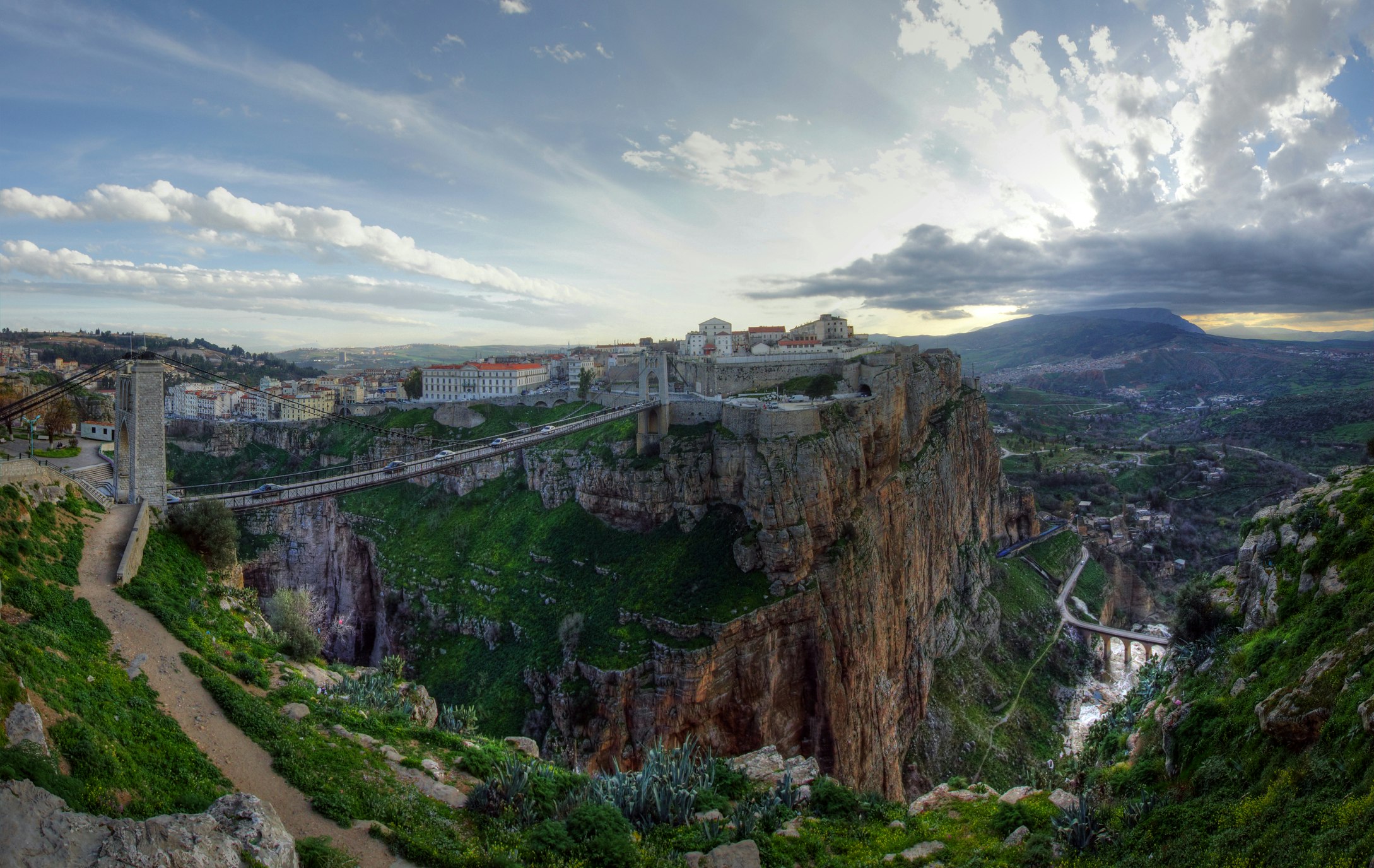 Constantine gorge, hanging bridge and stormy cloud