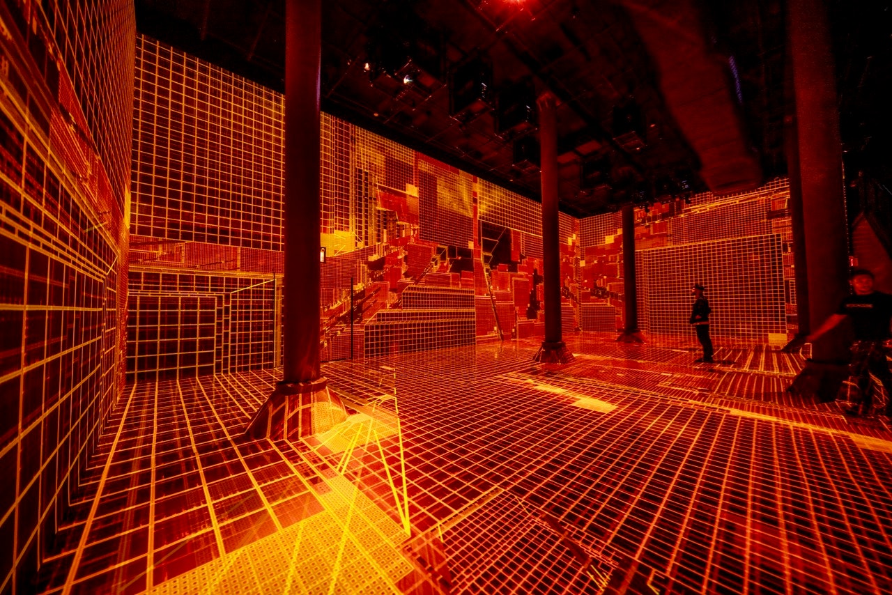ARTECHOUSE Refik Anadol underground installation neon orange grid