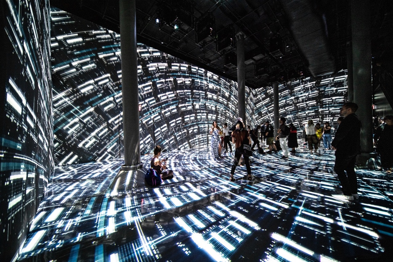 ARTECHOUSE Refik Anadol underground gallery grid with black white and blue swirling images 