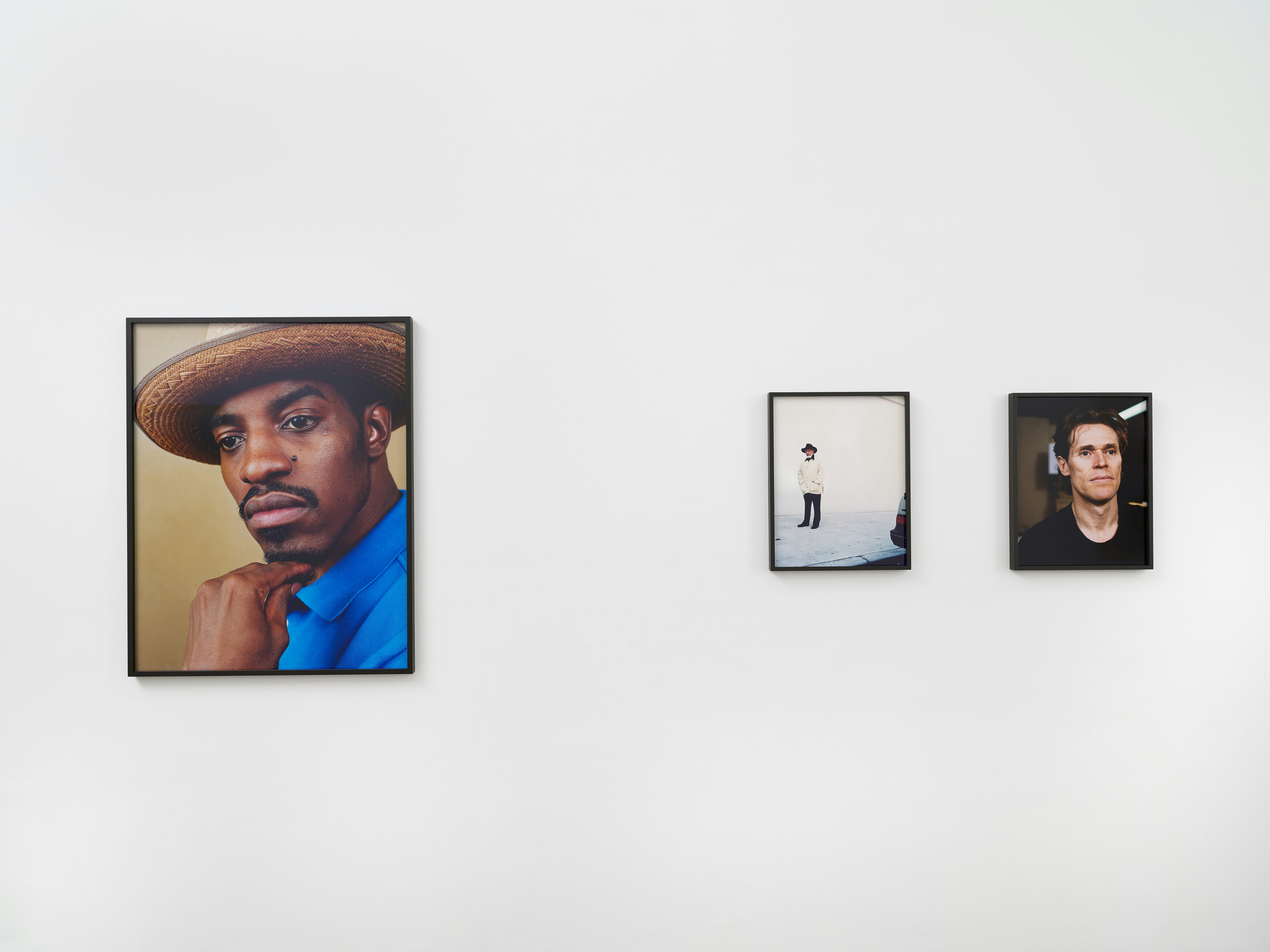 An installation view of Dana Lixenberg's American Images: from left, André Benjamin, Willem Dafoe, and Sonny Rollins