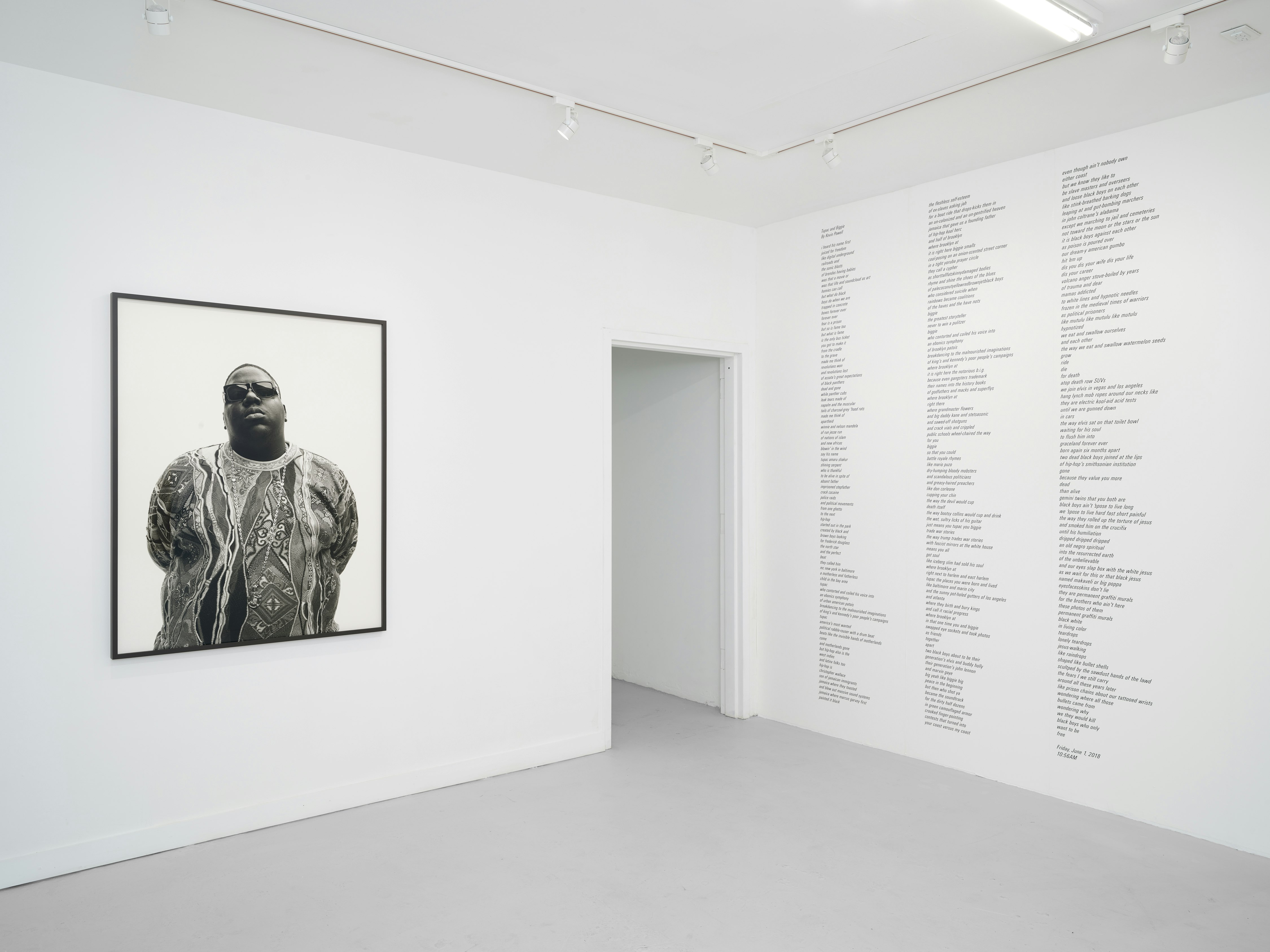 An installation view of Dana Lixenberg's American Images, featuring a photo of Biggie Smalls