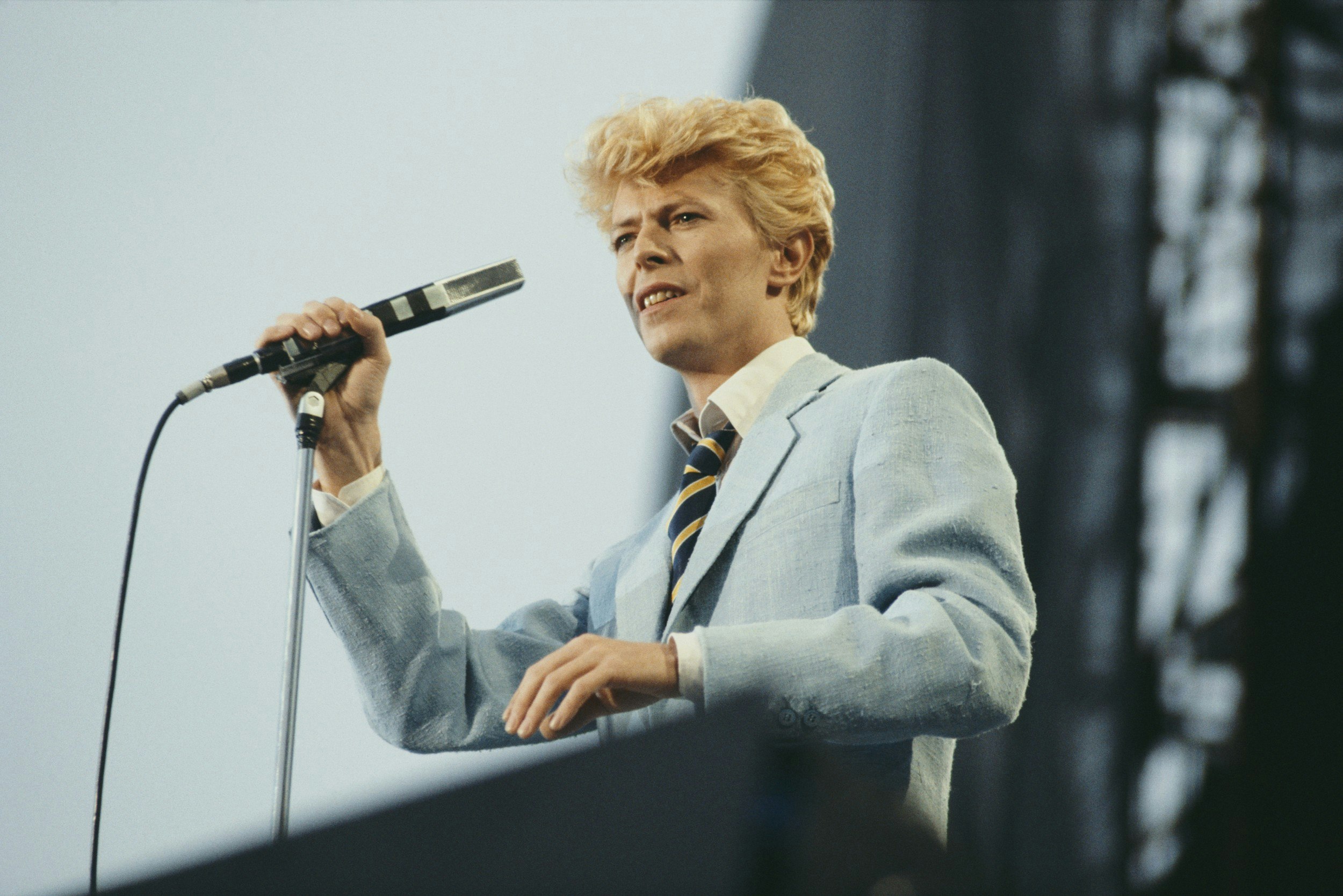 David Bowie performing on stage on the first date of his Serious Moonlight World Tour at Vorst Forest Nationaal in Brussels in 1983.